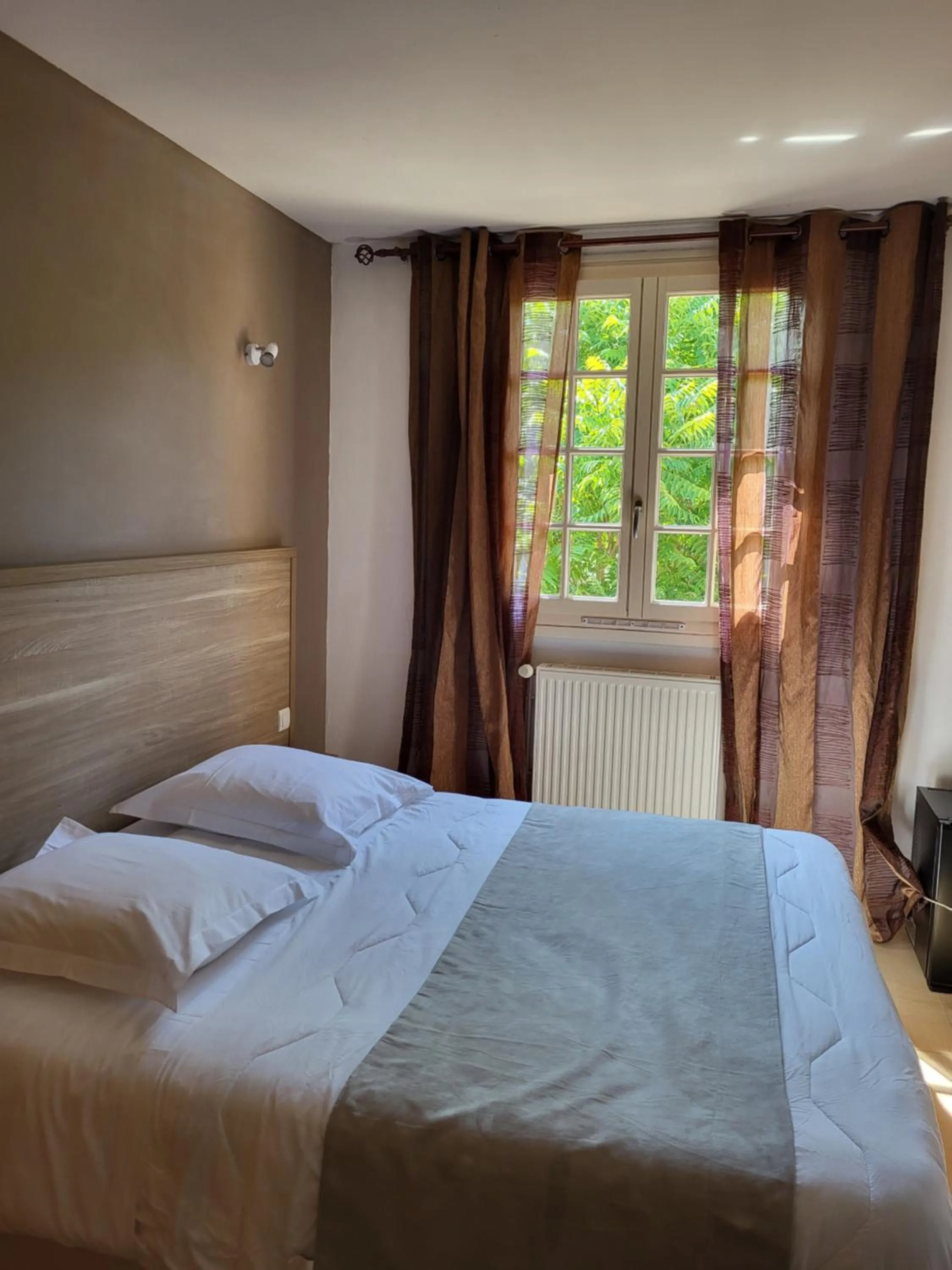 Bed in Hôtel La Flambée