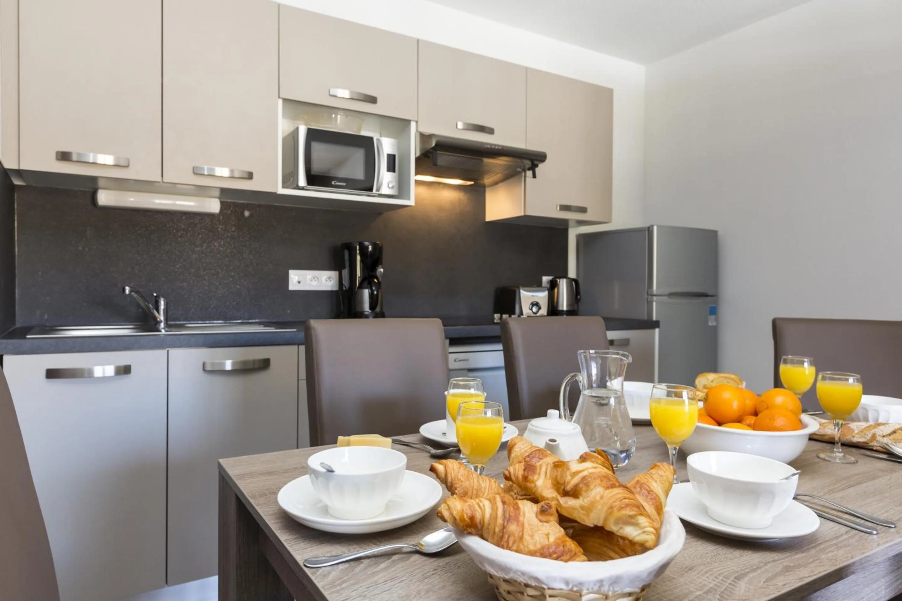 Kitchen or kitchenette in Résidence Odalys Front de Neige