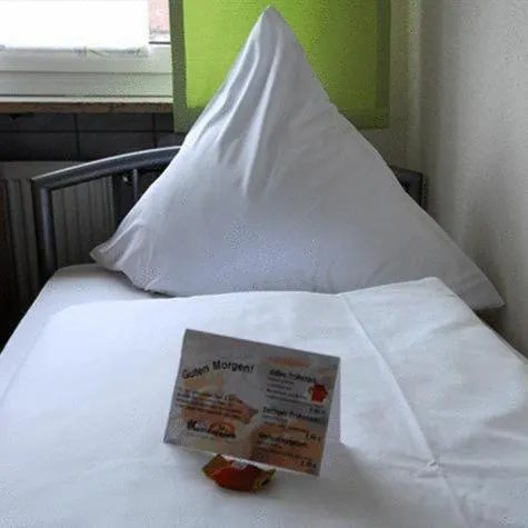 Bed in Gästehaus zur Linde