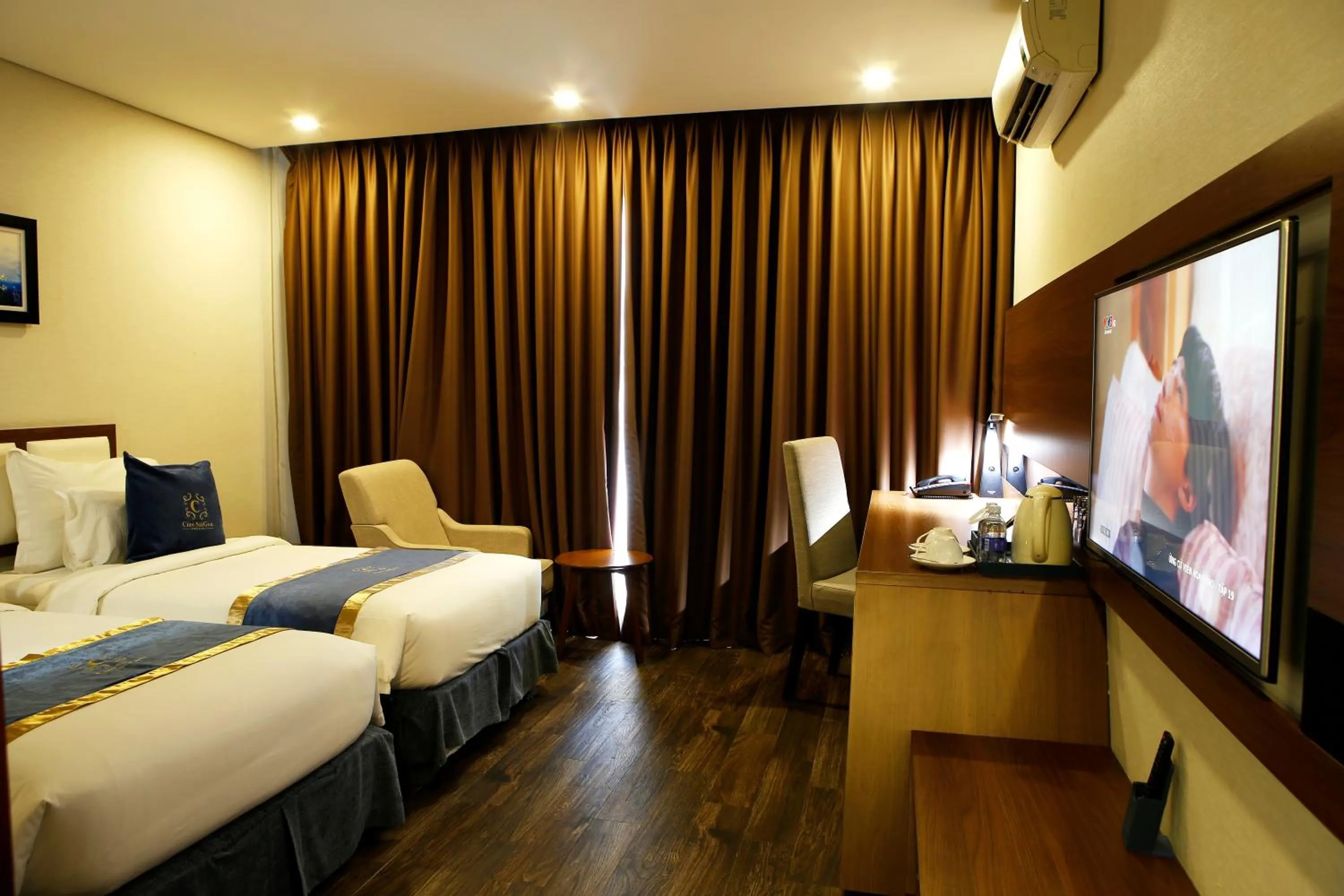 Bed in Ciao SaiGon Hotel & Spa