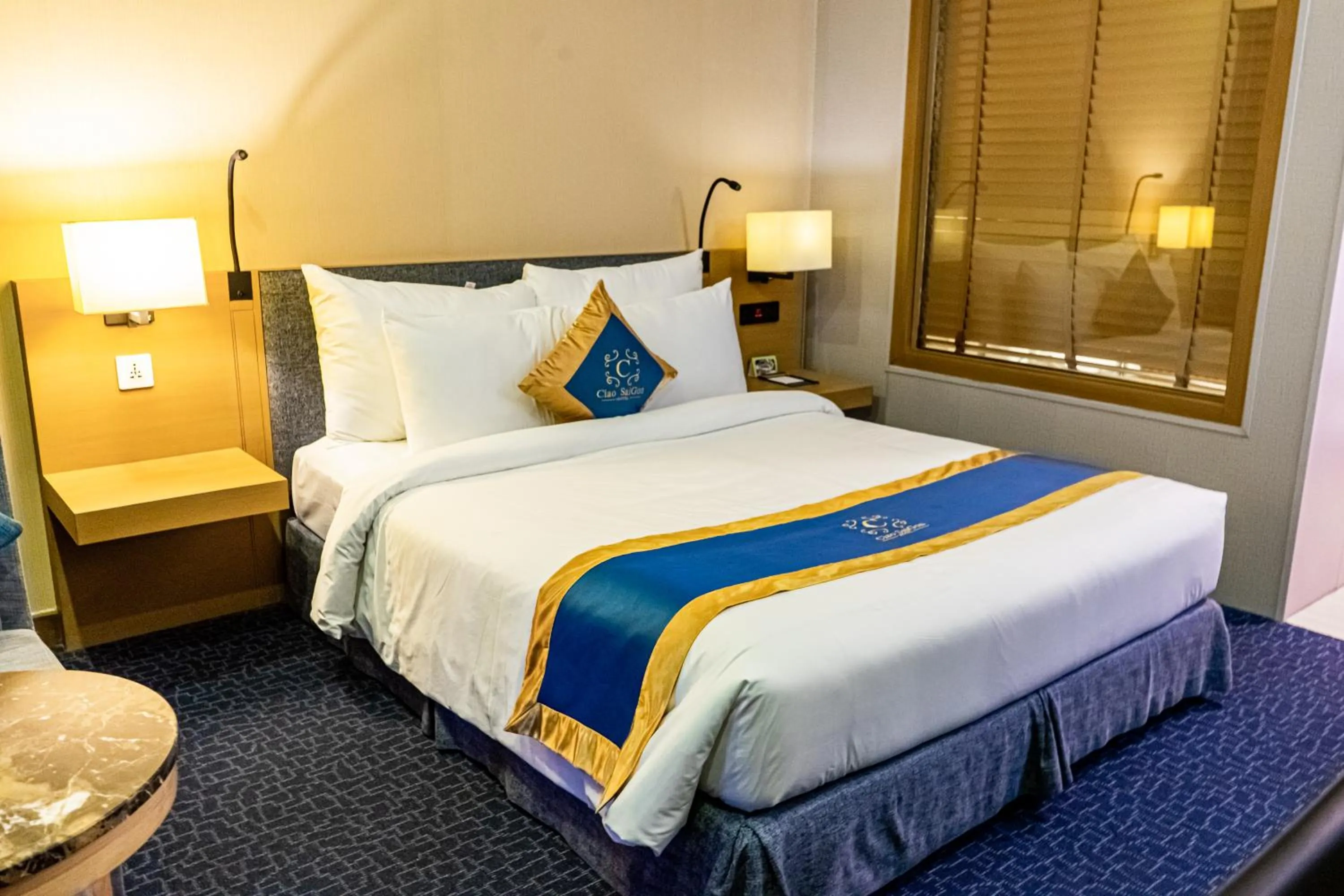 Bed in Ciao SaiGon Hotel & Spa