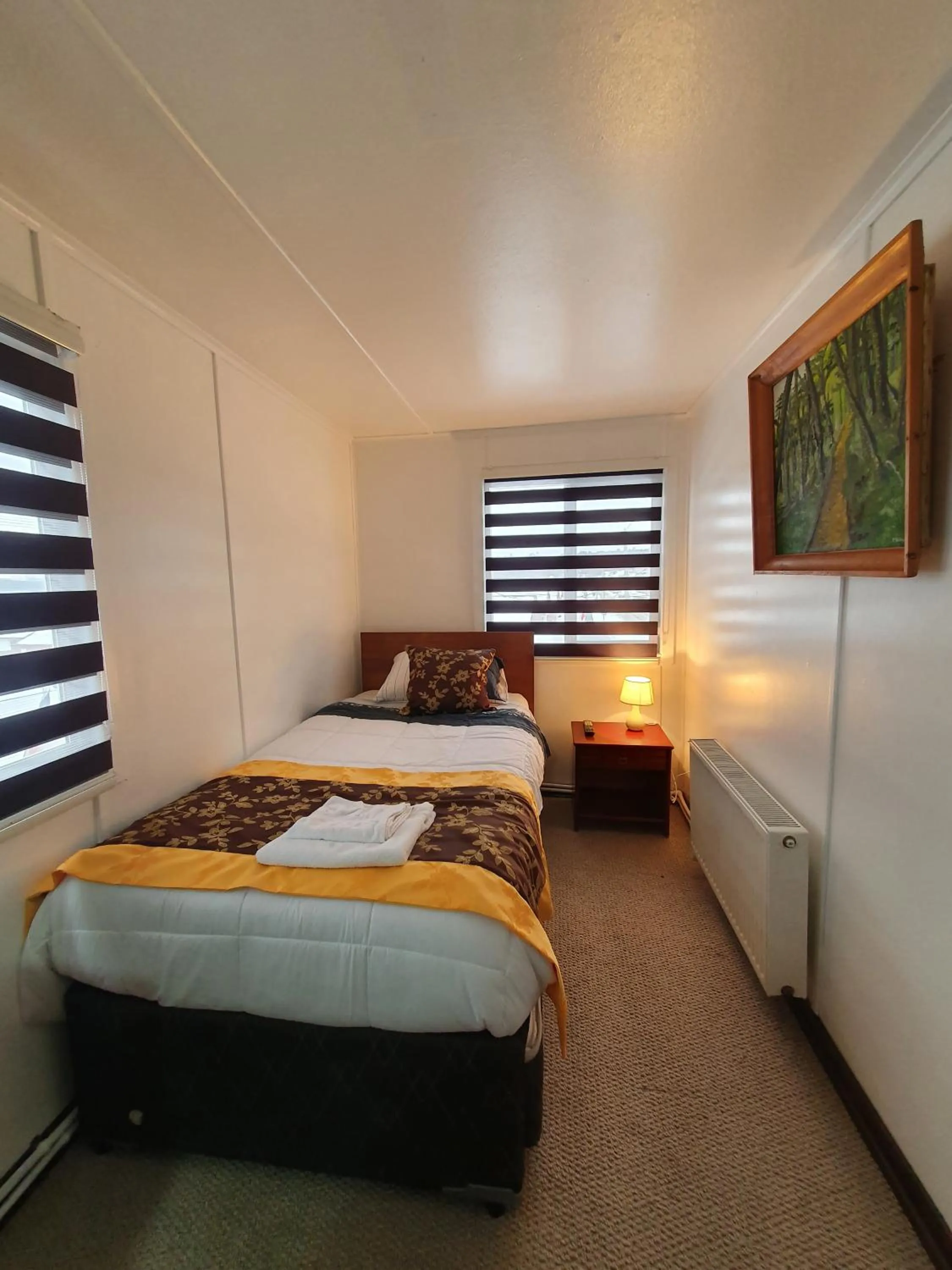 Property building, Bed in Hotel Forjadores del Cabo de Hornos