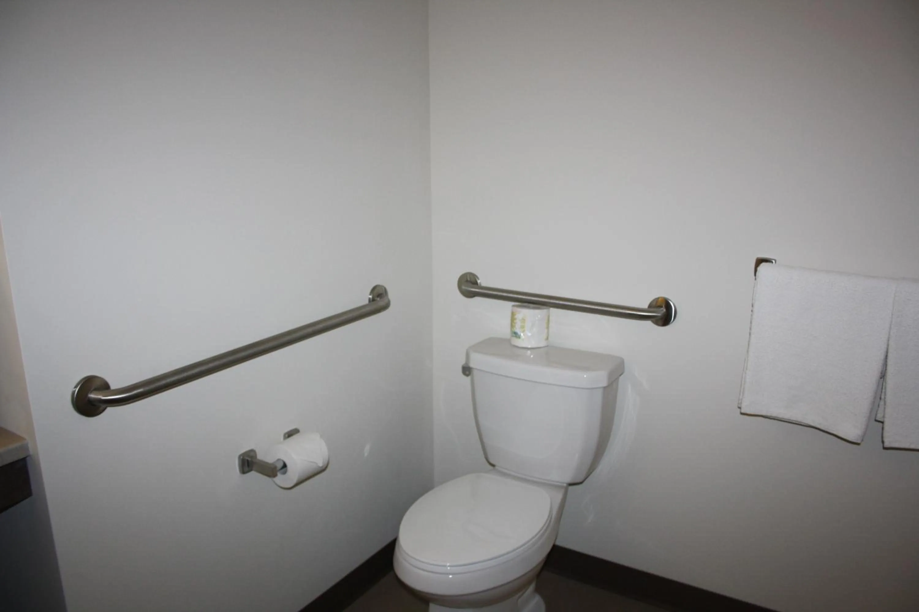 Bathroom in Crossroads Inn & Suites