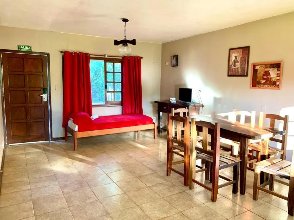 Living room, Bed in Beer Hotel Iguazú