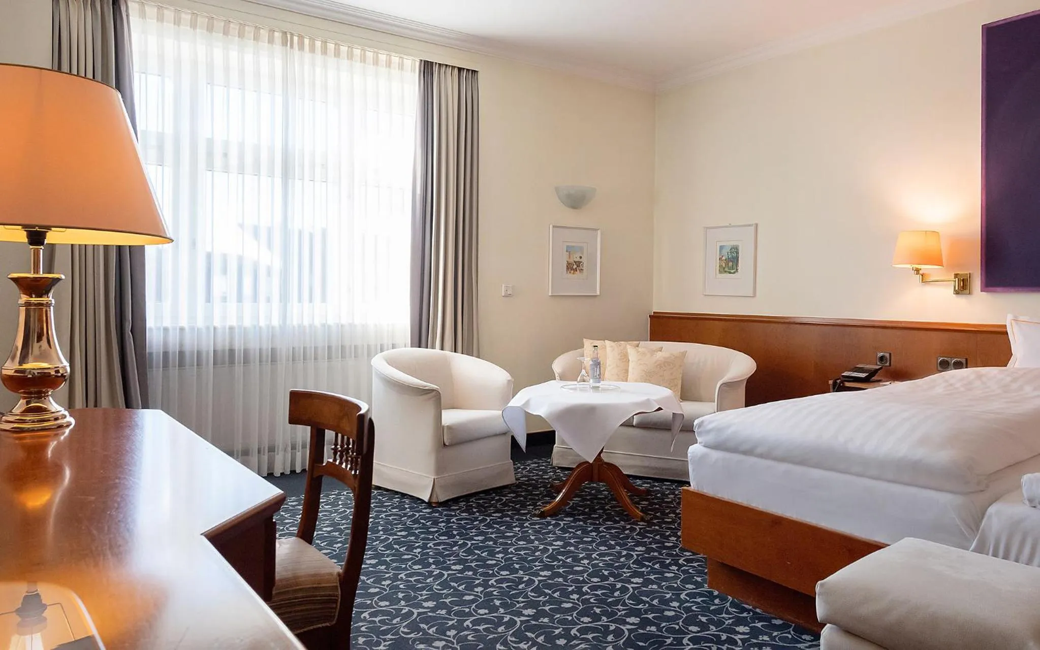 Photo of the whole room, Bed in RomanticHOTEL Goldener Karpfen