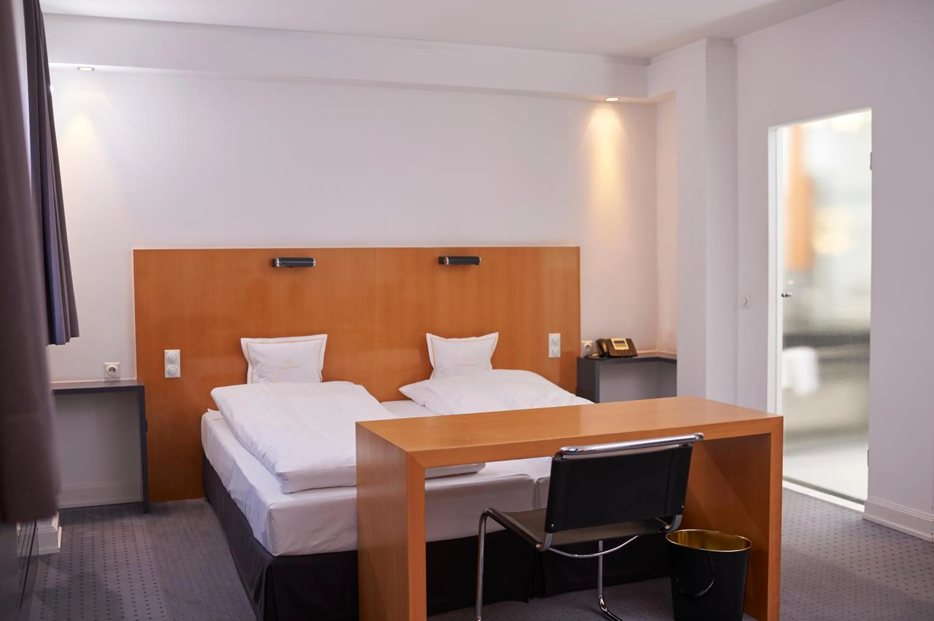 Photo of the whole room, Bed in RomanticHOTEL Goldener Karpfen