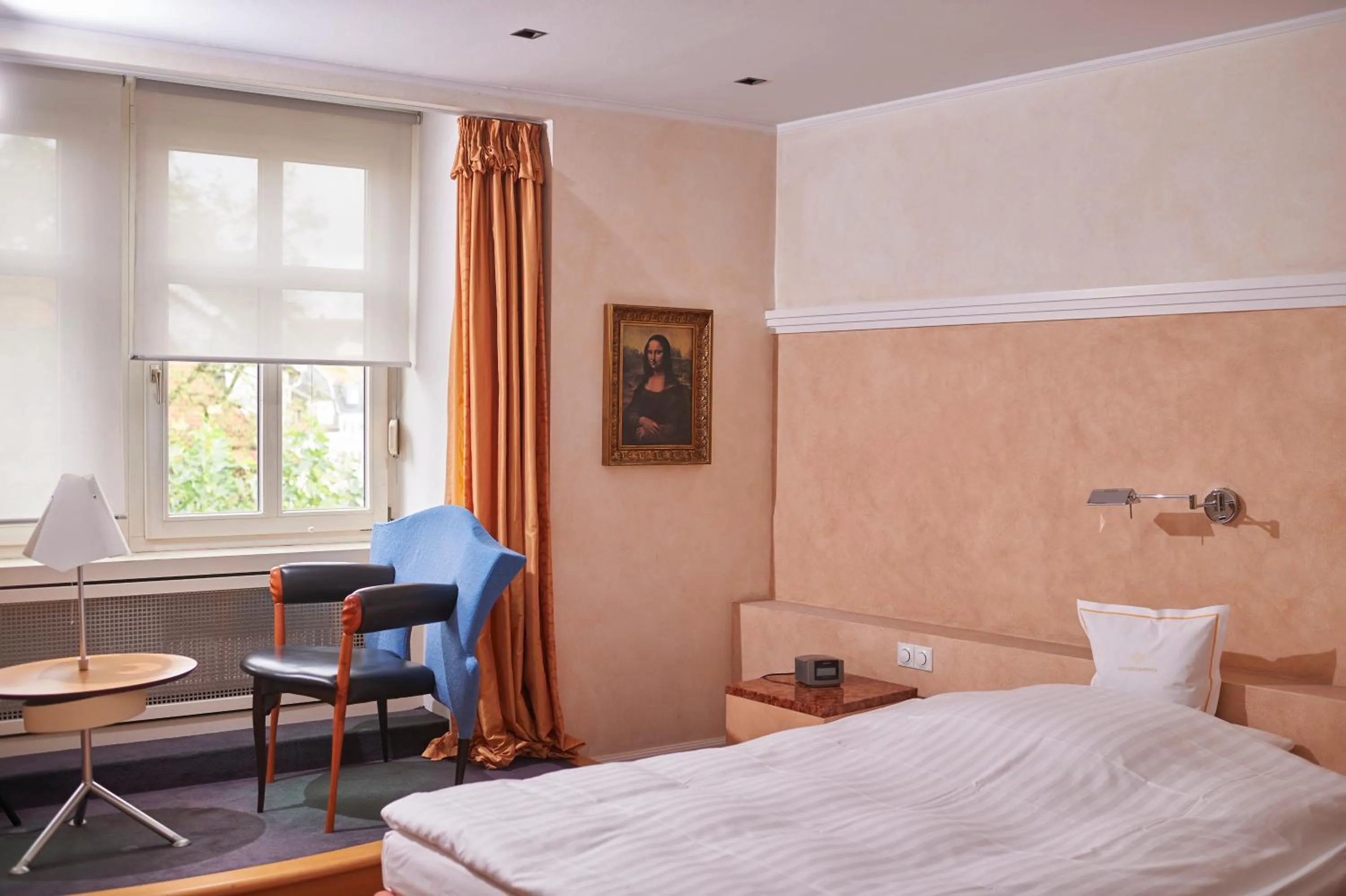 Photo of the whole room, Bed in RomanticHOTEL Goldener Karpfen