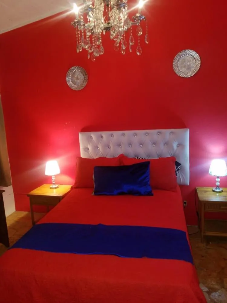 Bed in Hotel El Tronco Inc