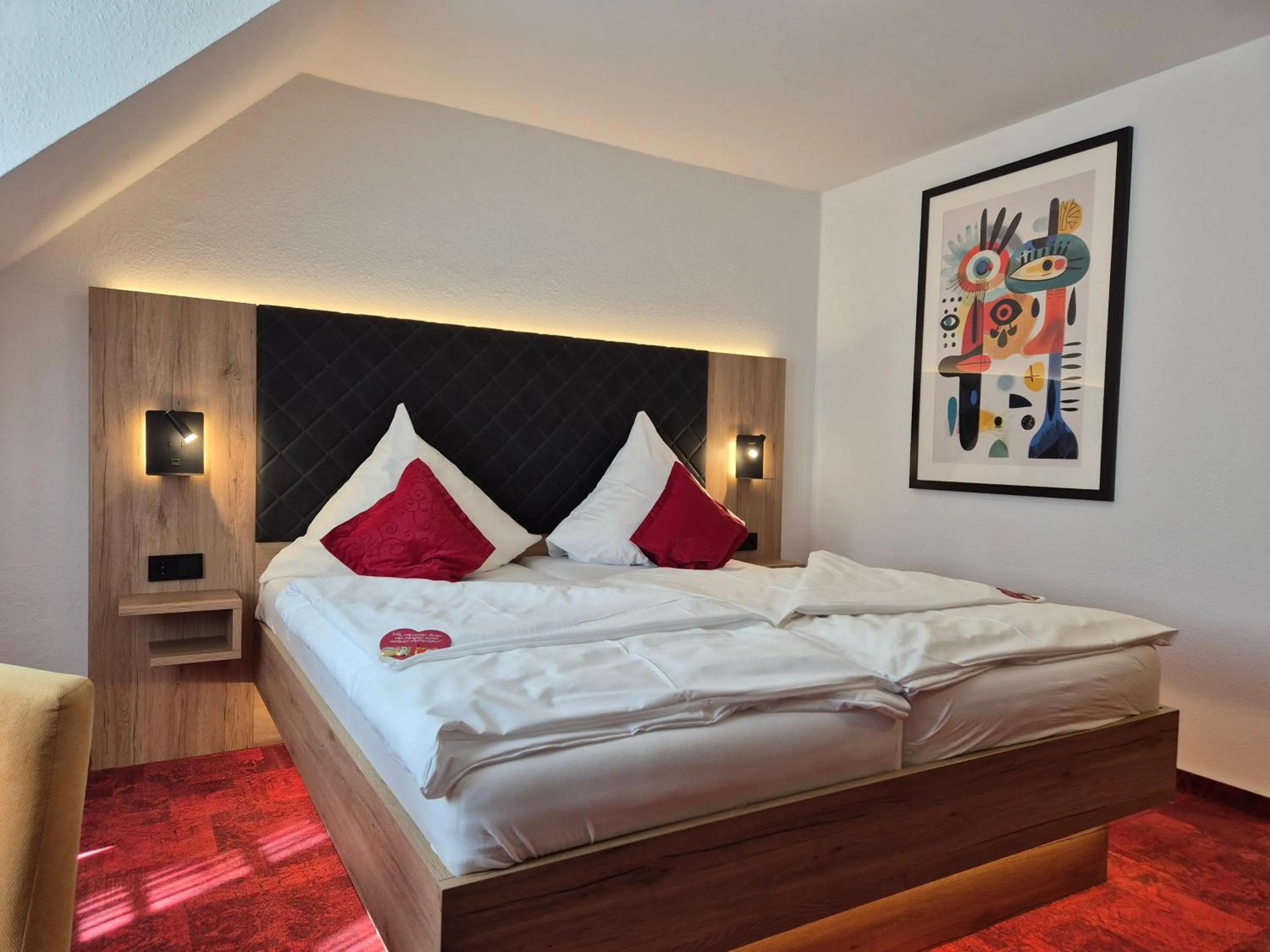 Bed in Hotel St. Georg Garni