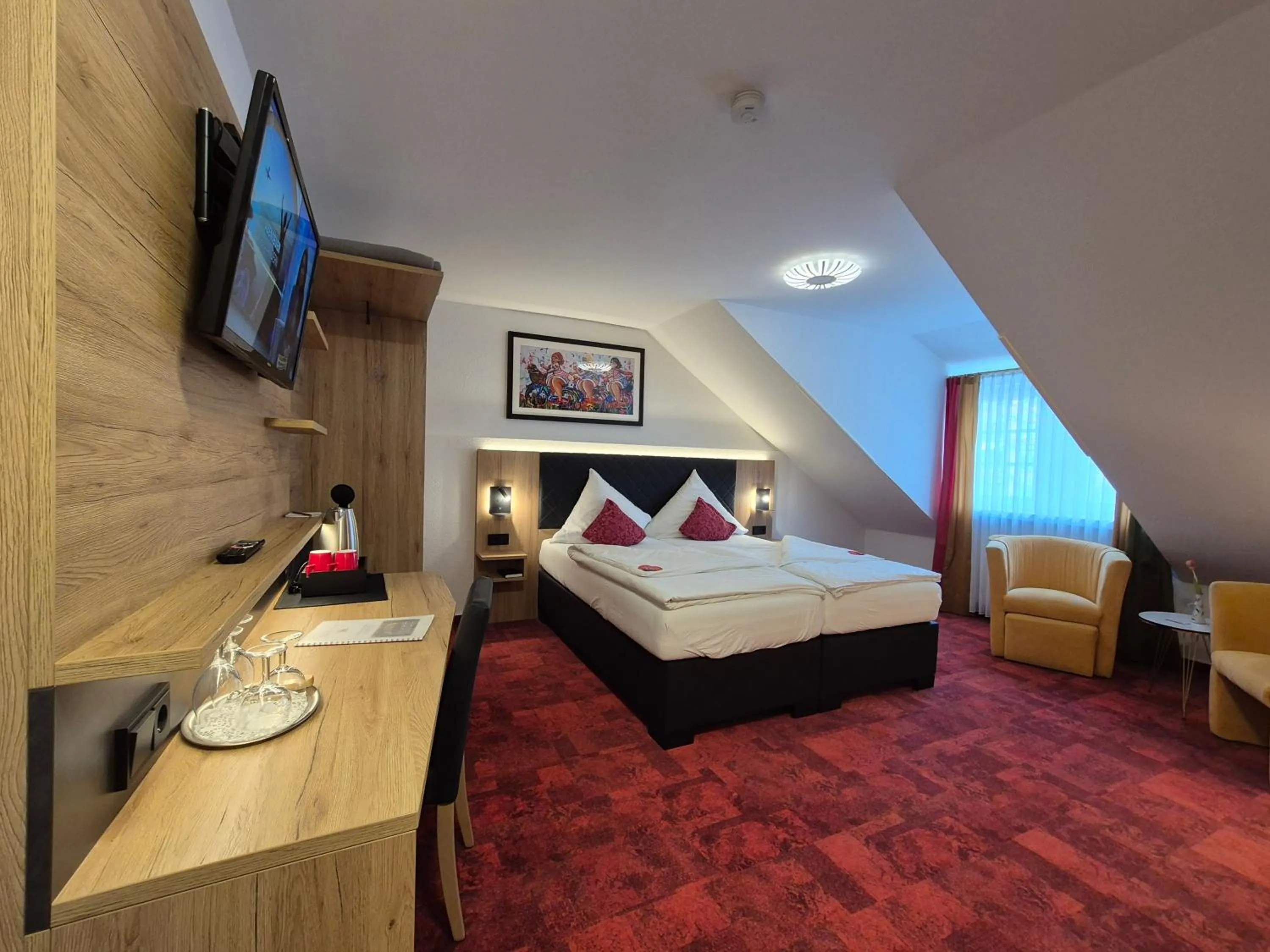 Bed in Hotel St. Georg Garni