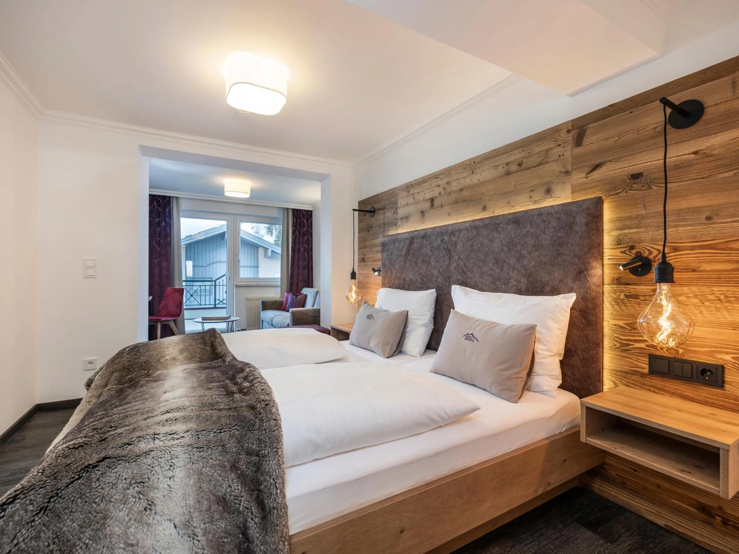 Seating area, Bed in Hotel Zehnerkar & Hotel Obertauern