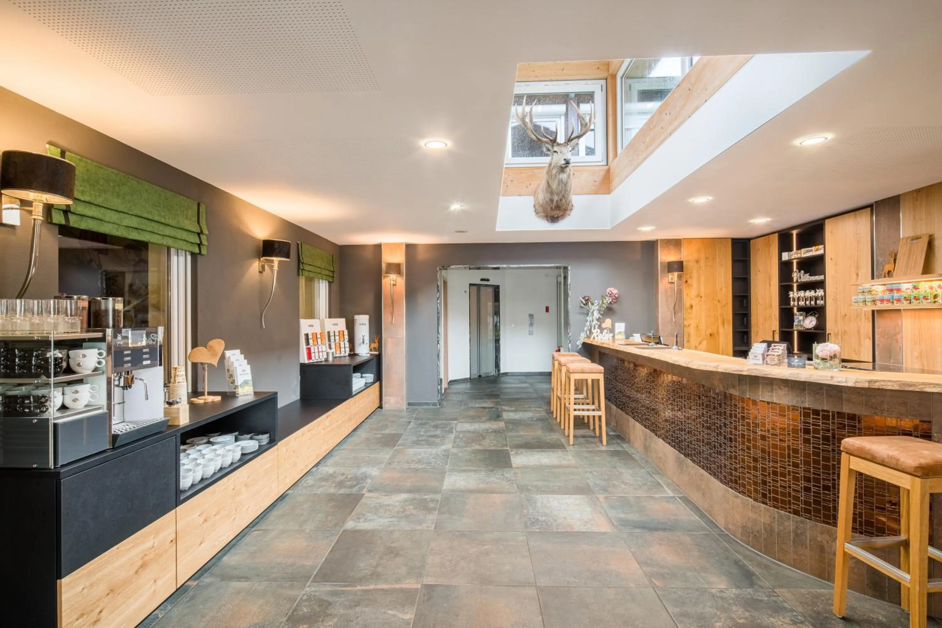 Lobby or reception in Hotel Hofgut Tiergarten