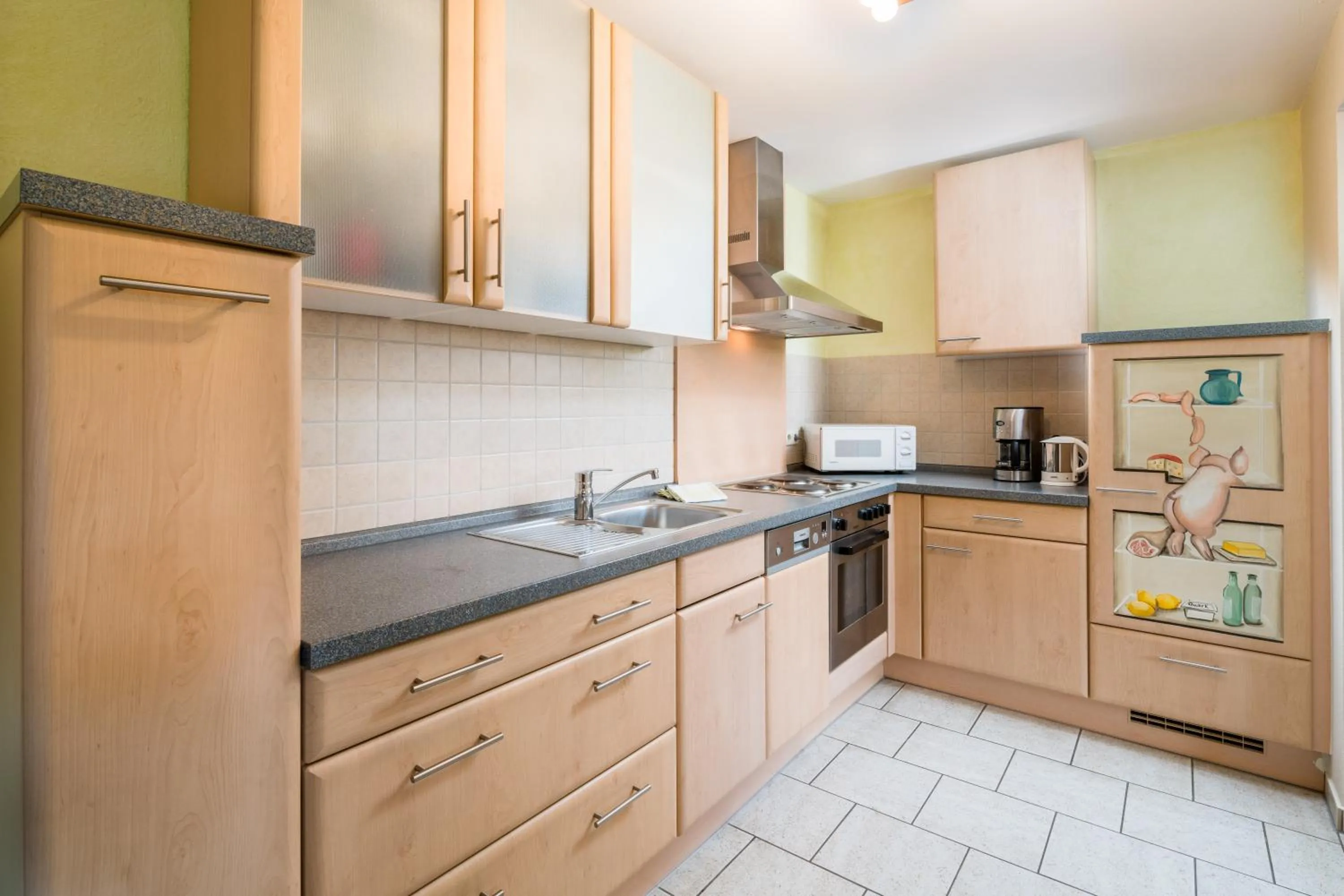 Kitchen or kitchenette in Hotel Hofgut Tiergarten