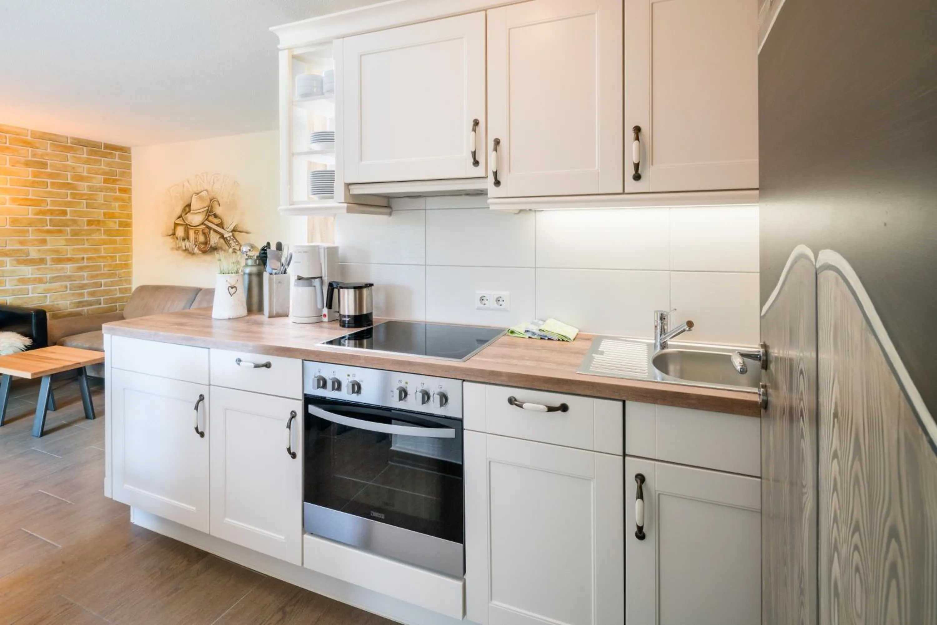 Kitchen or kitchenette in Hotel Hofgut Tiergarten