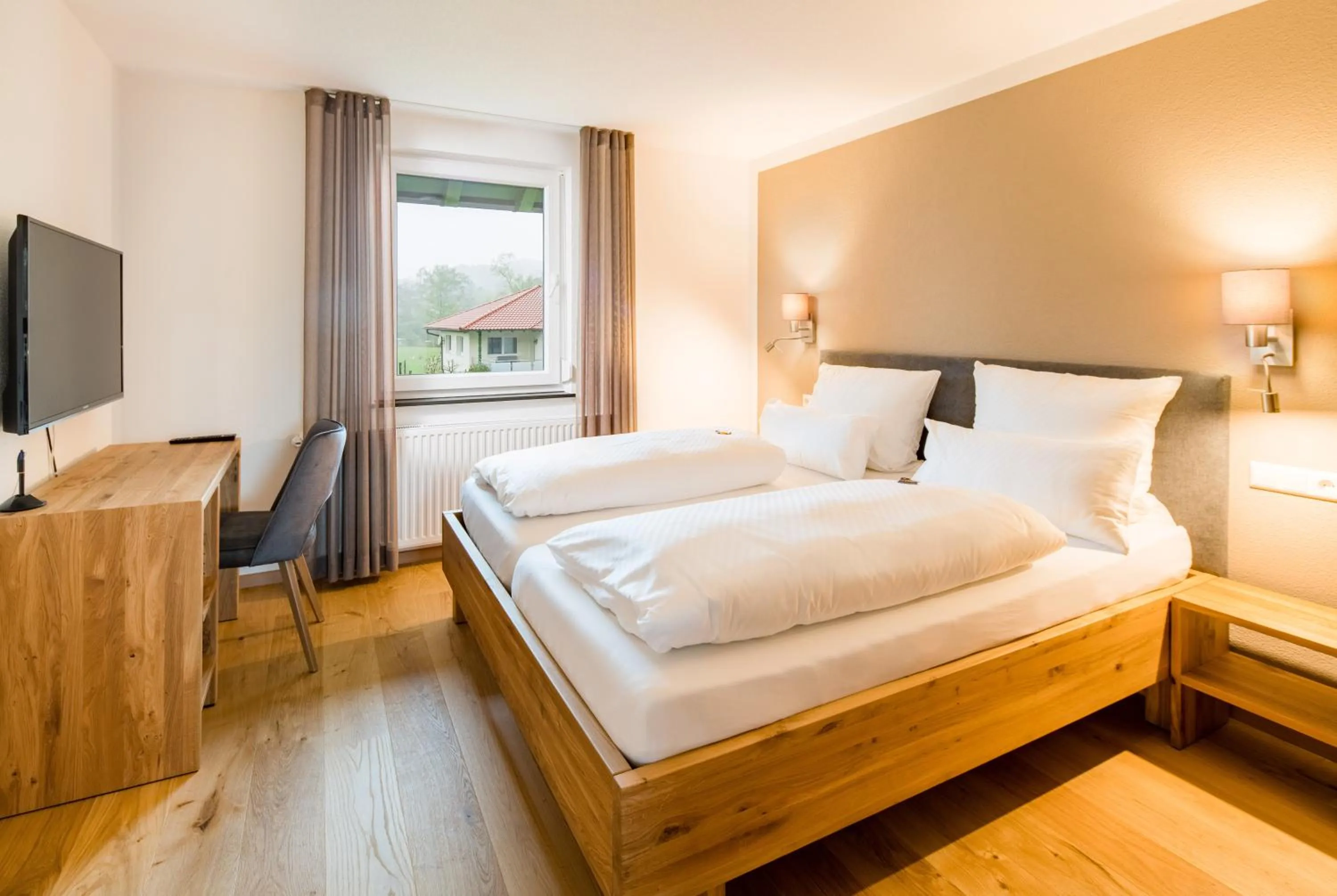 Photo of the whole room, Bed in Hotel Hofgut Tiergarten