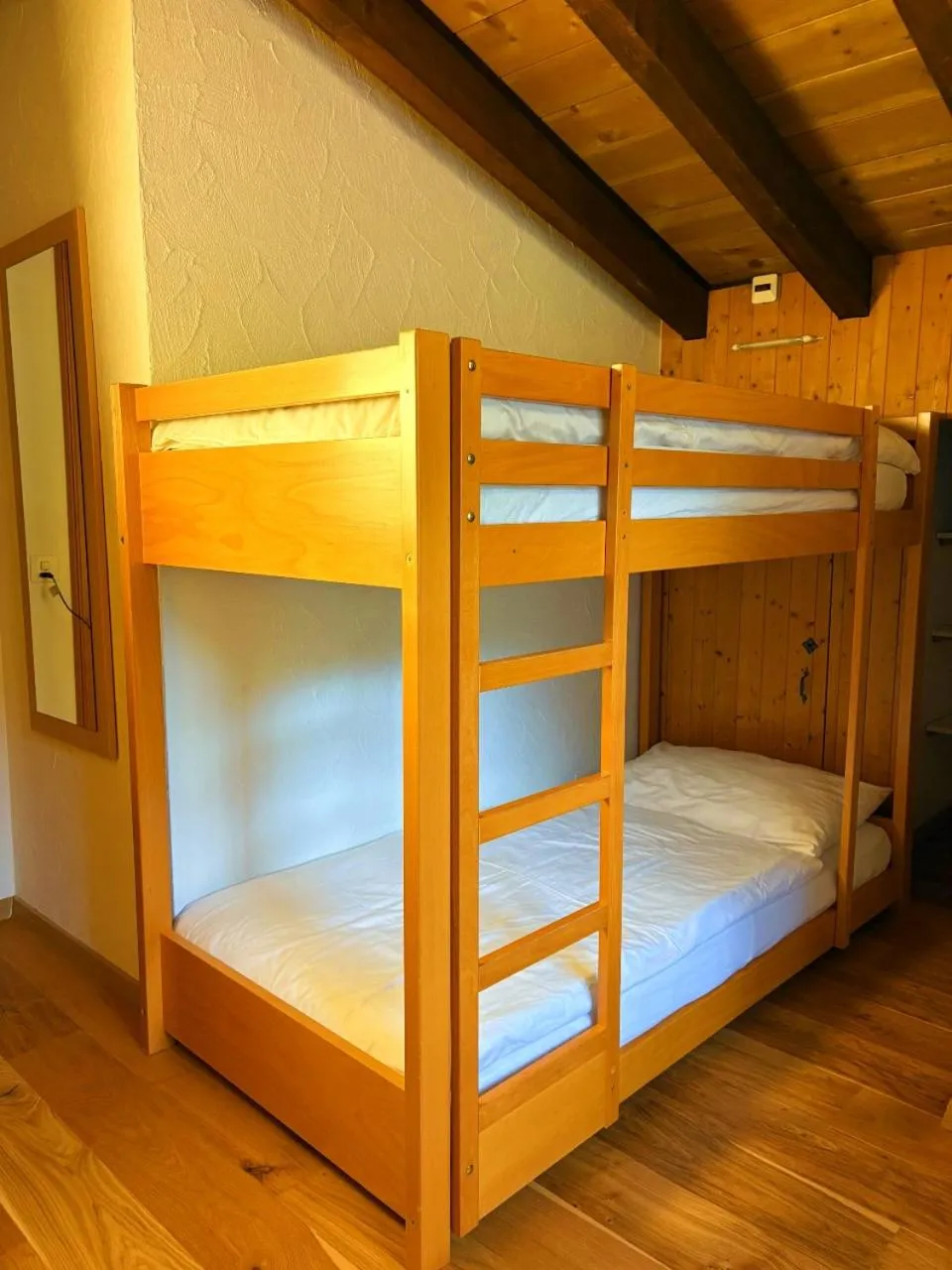 Photo of the whole room, Bed in Madrisa Lodge