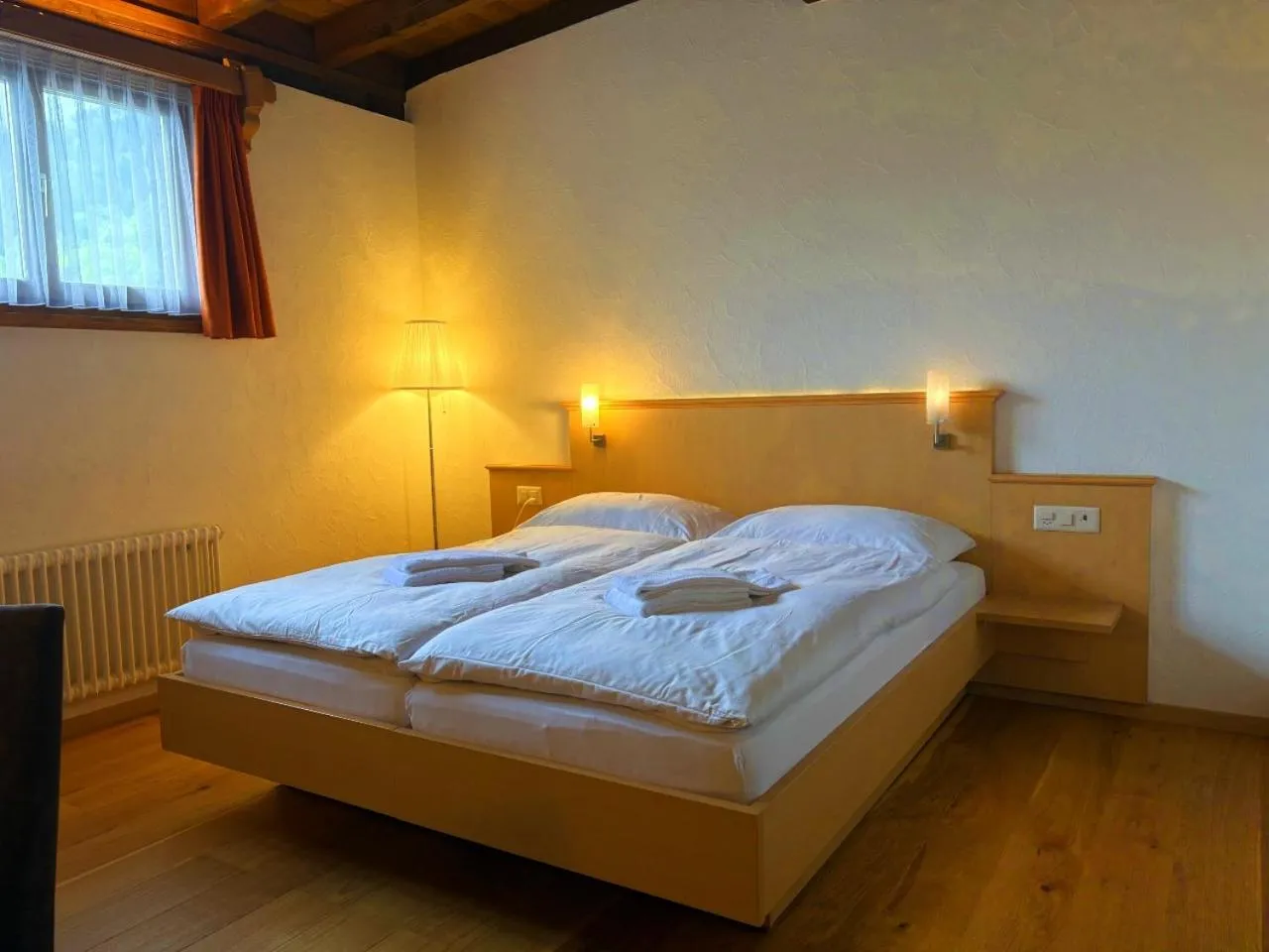 Photo of the whole room, Bed in Madrisa Lodge