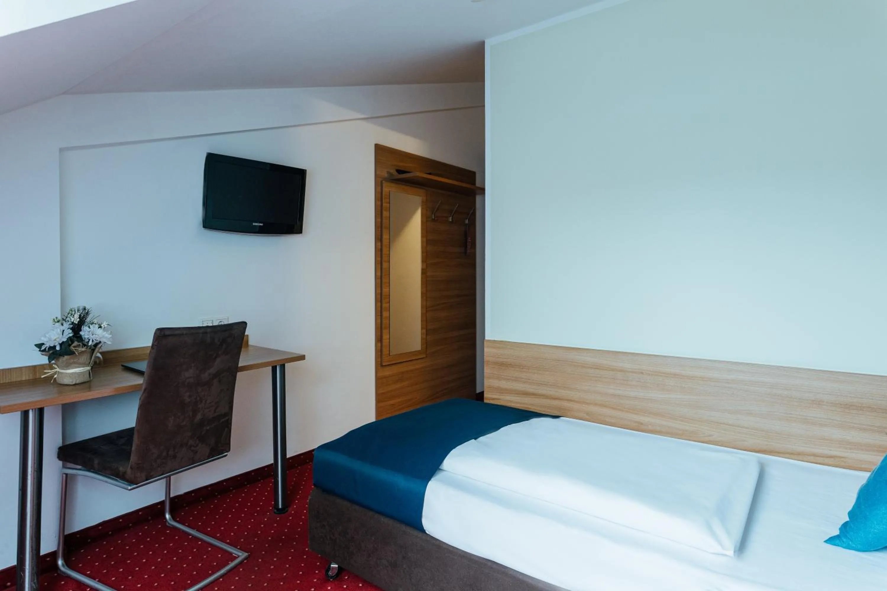 Bed in Hotel Andra München