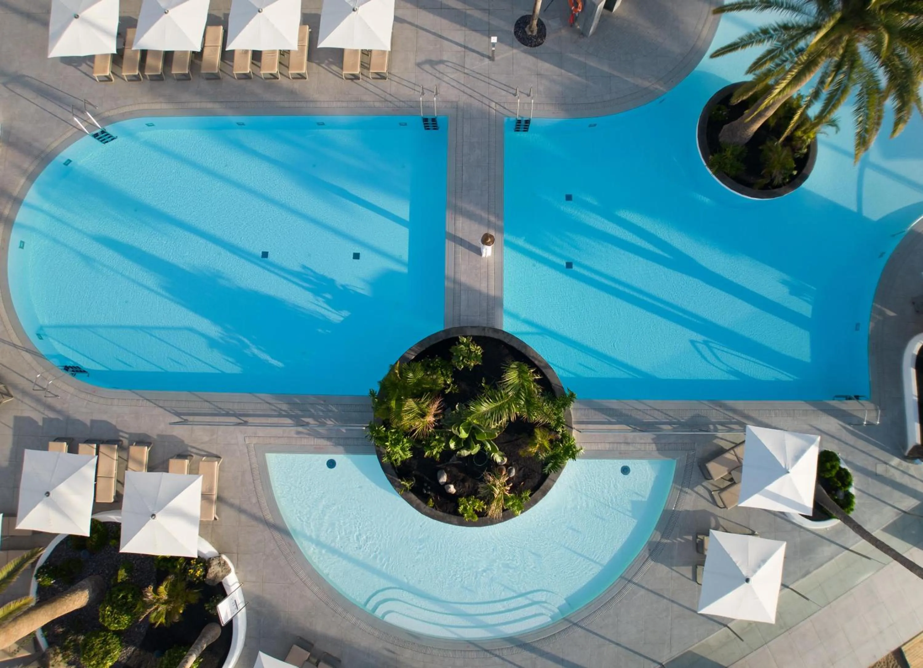 Swimming pool in Plus Fariones Suite Hotel