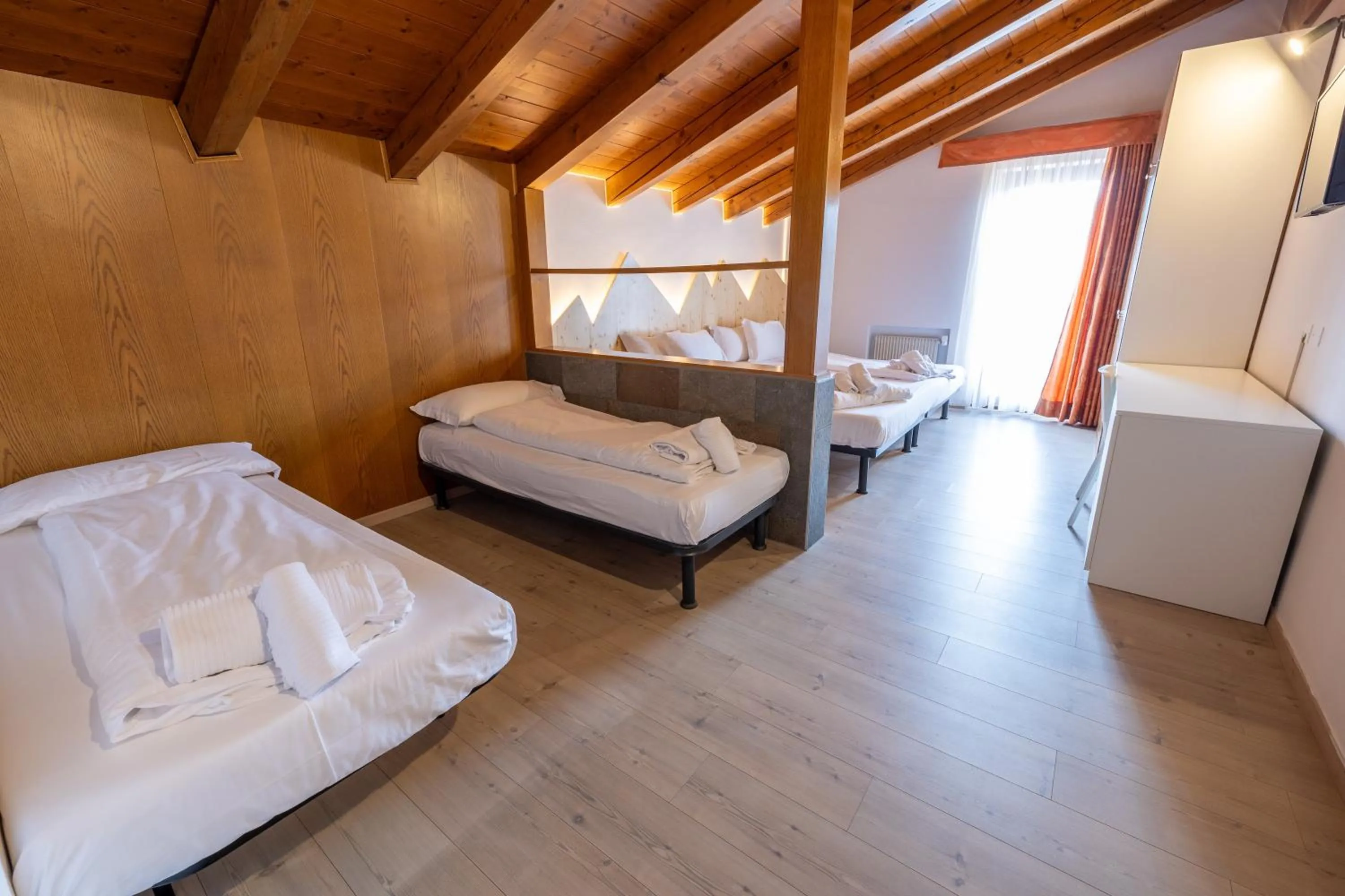 Bed in Hotel Villaggio Nevada