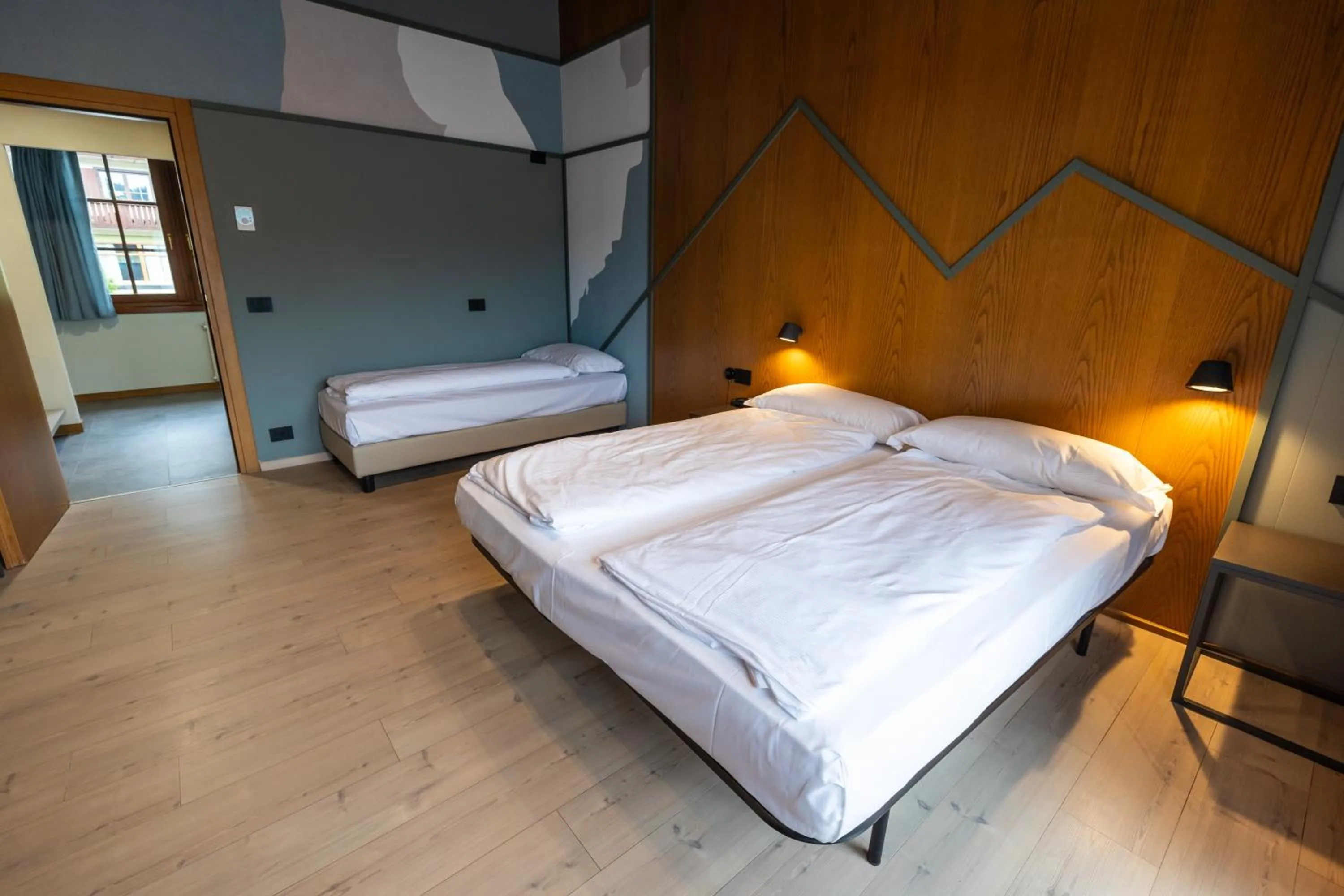 Bed in Hotel Villaggio Nevada