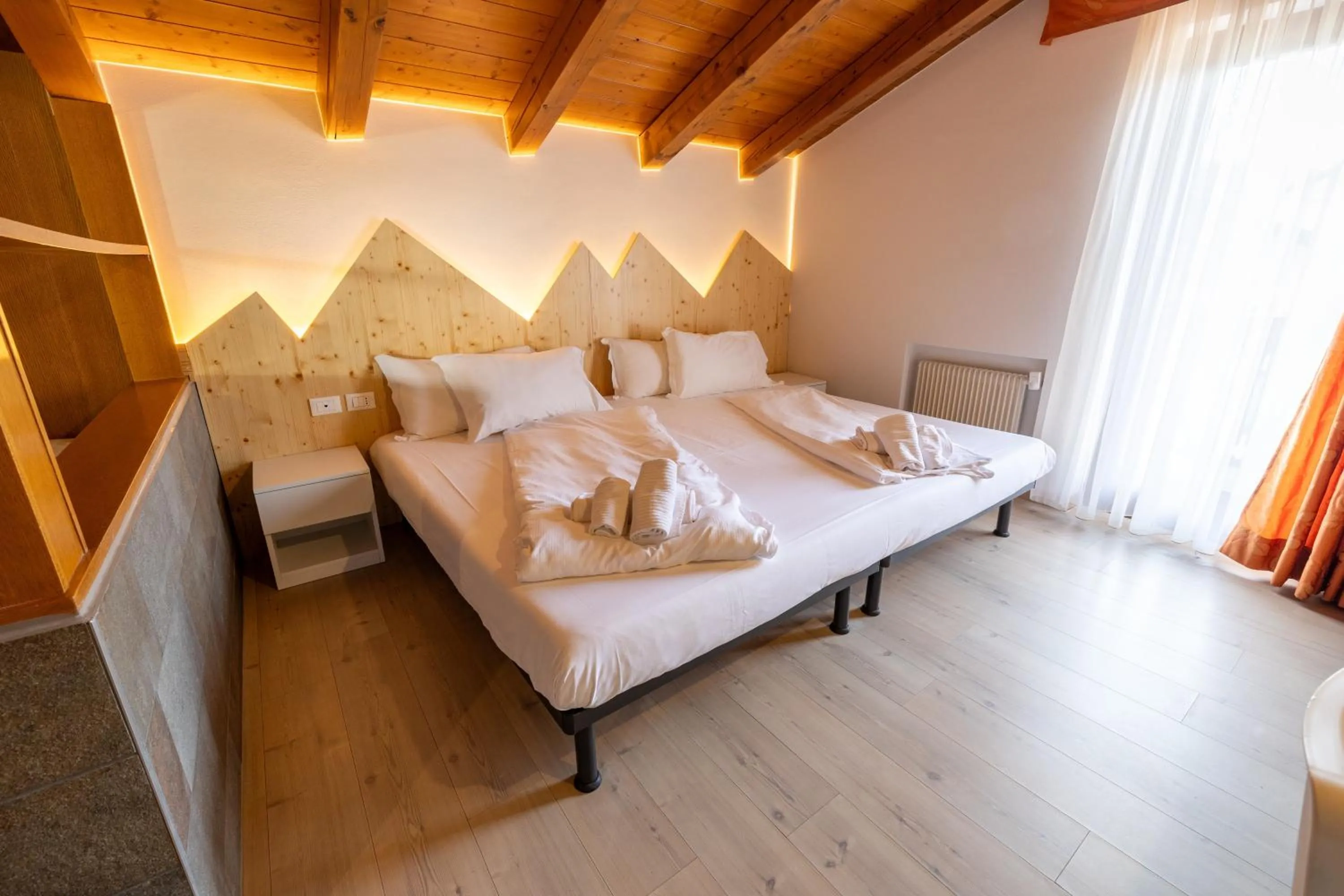 Bed in Hotel Villaggio Nevada