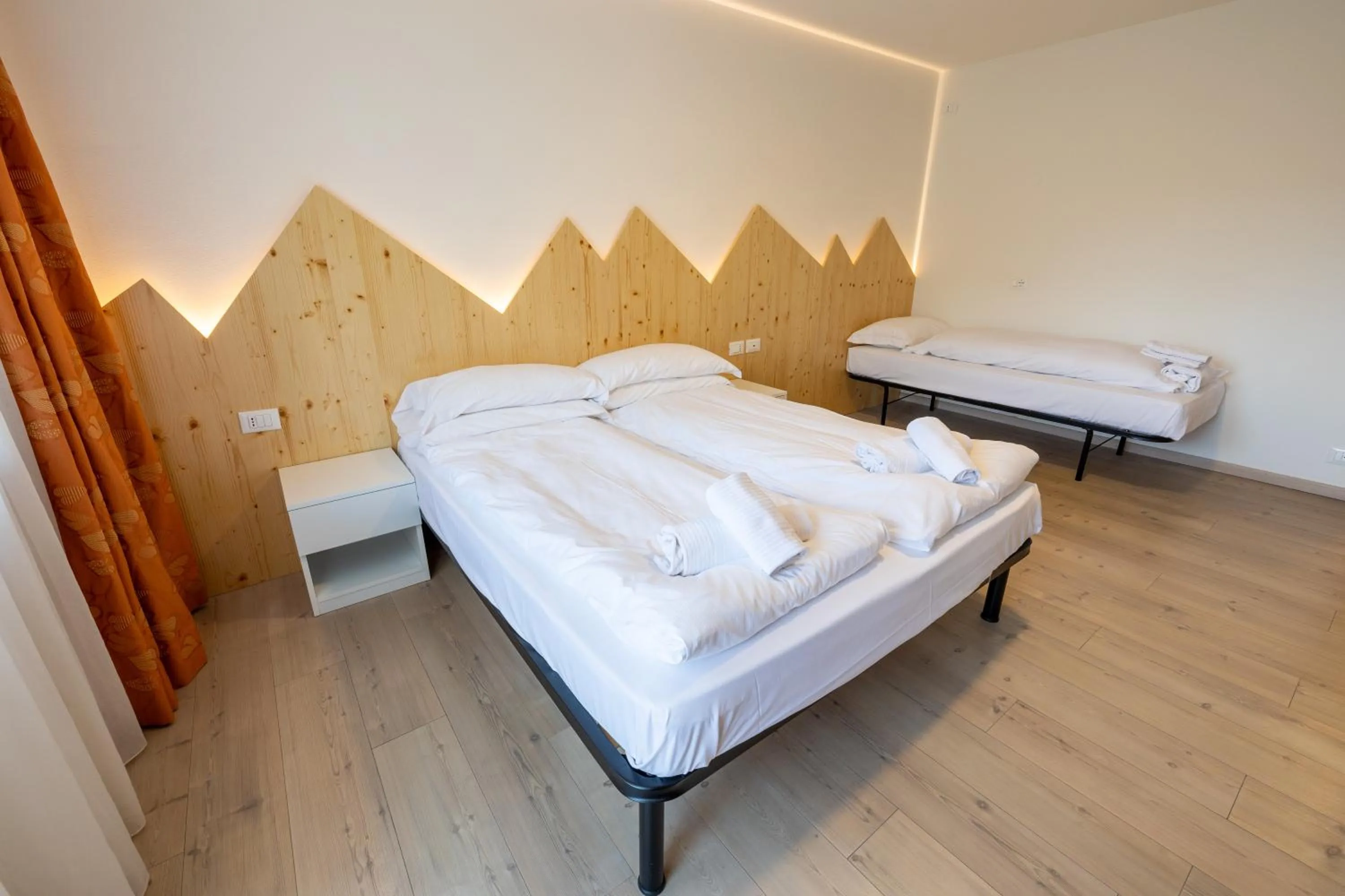 Bed in Hotel Villaggio Nevada