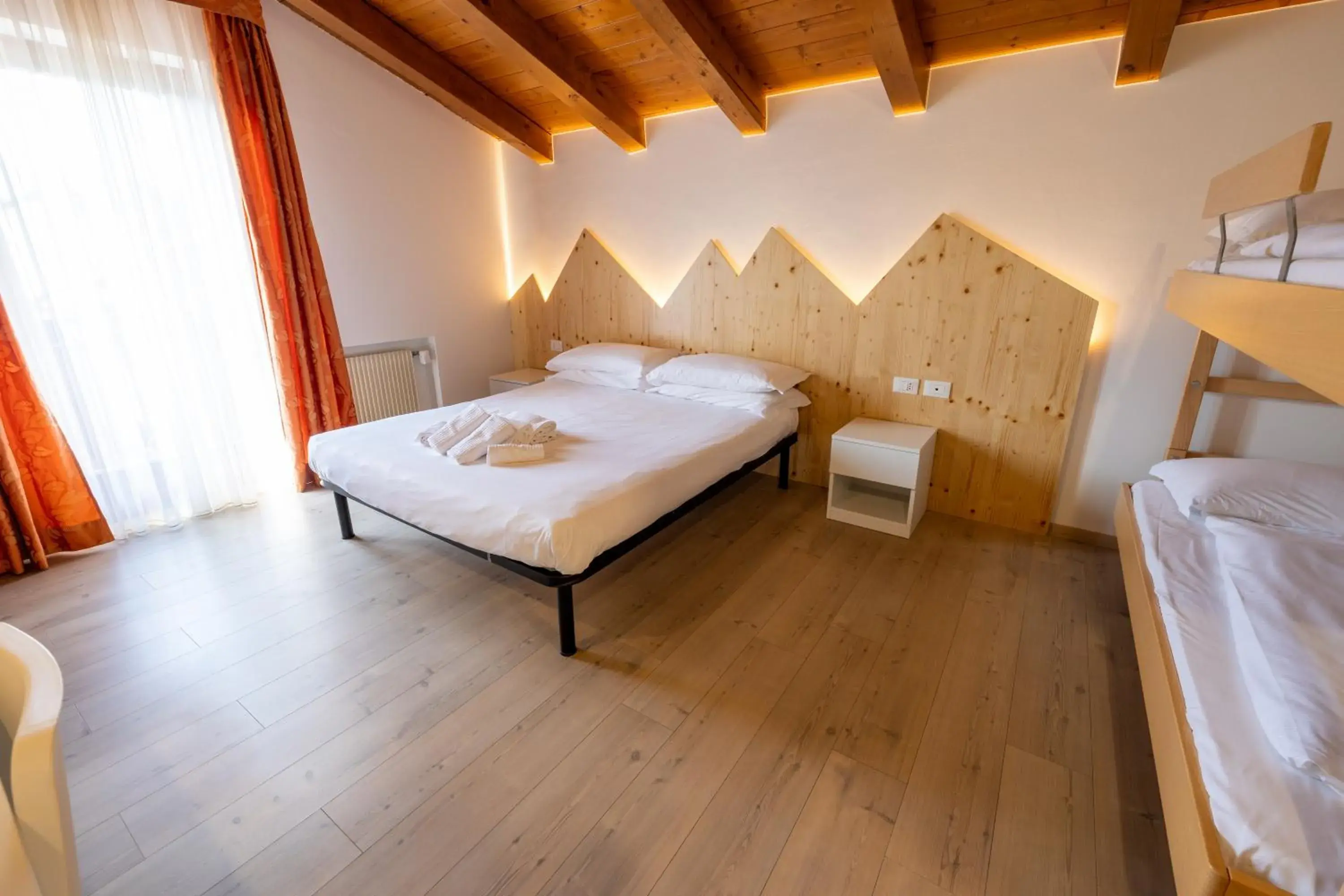 Standard Quadruple Room in Hotel Villaggio Nevada Standard Quadruple Room in Hotel Villaggio Nevada