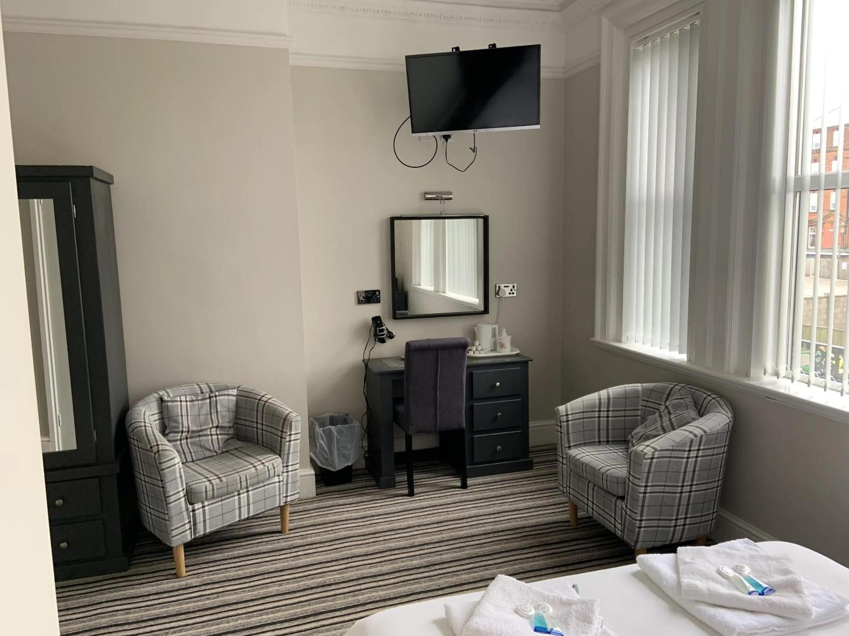 Bedroom in Arona Guest Hotel