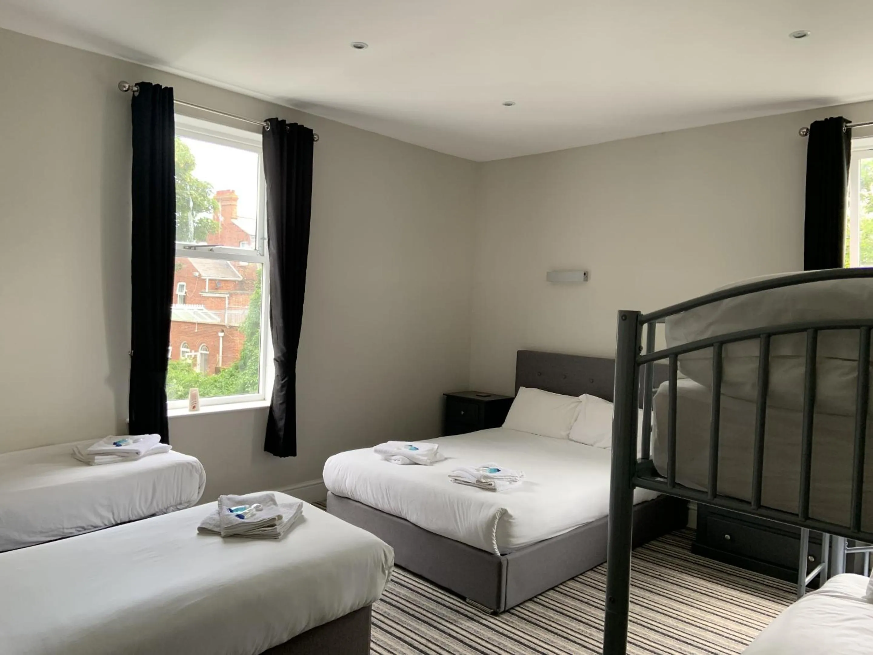 Bedroom in Arona Guest Hotel