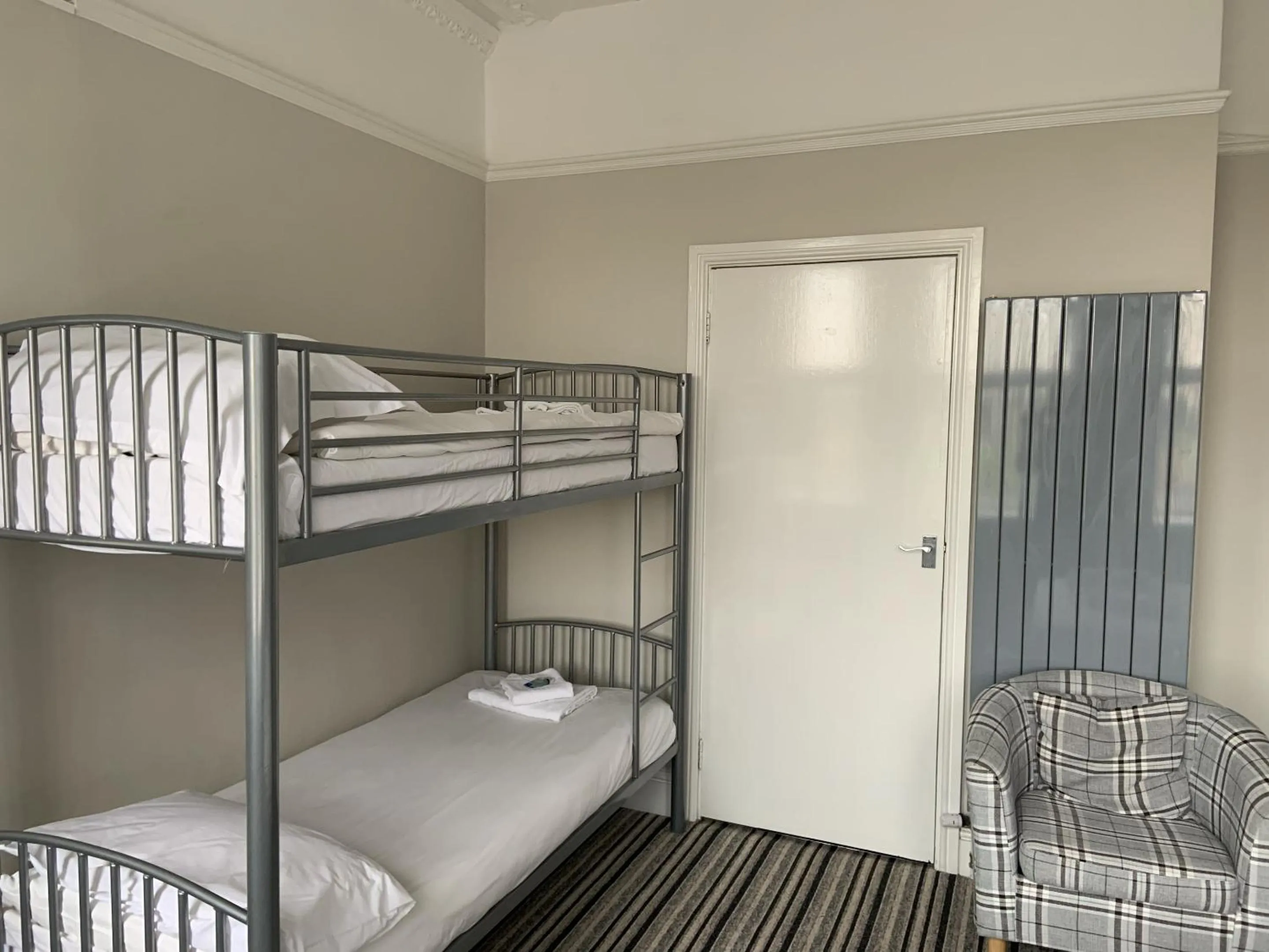 Bedroom in Arona Guest Hotel