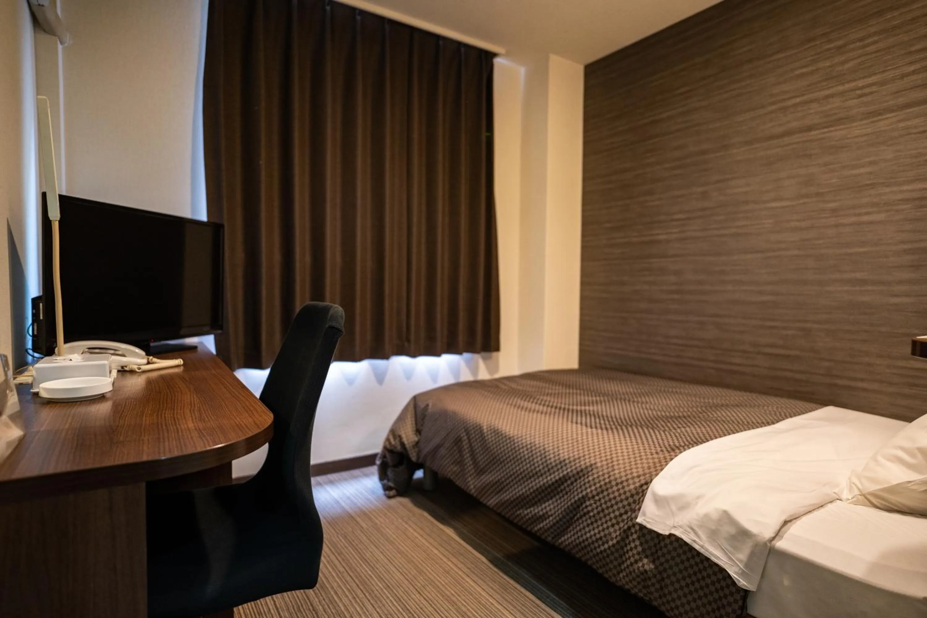 Photo of the whole room, Bed in Isahaya Daiichi Hotel