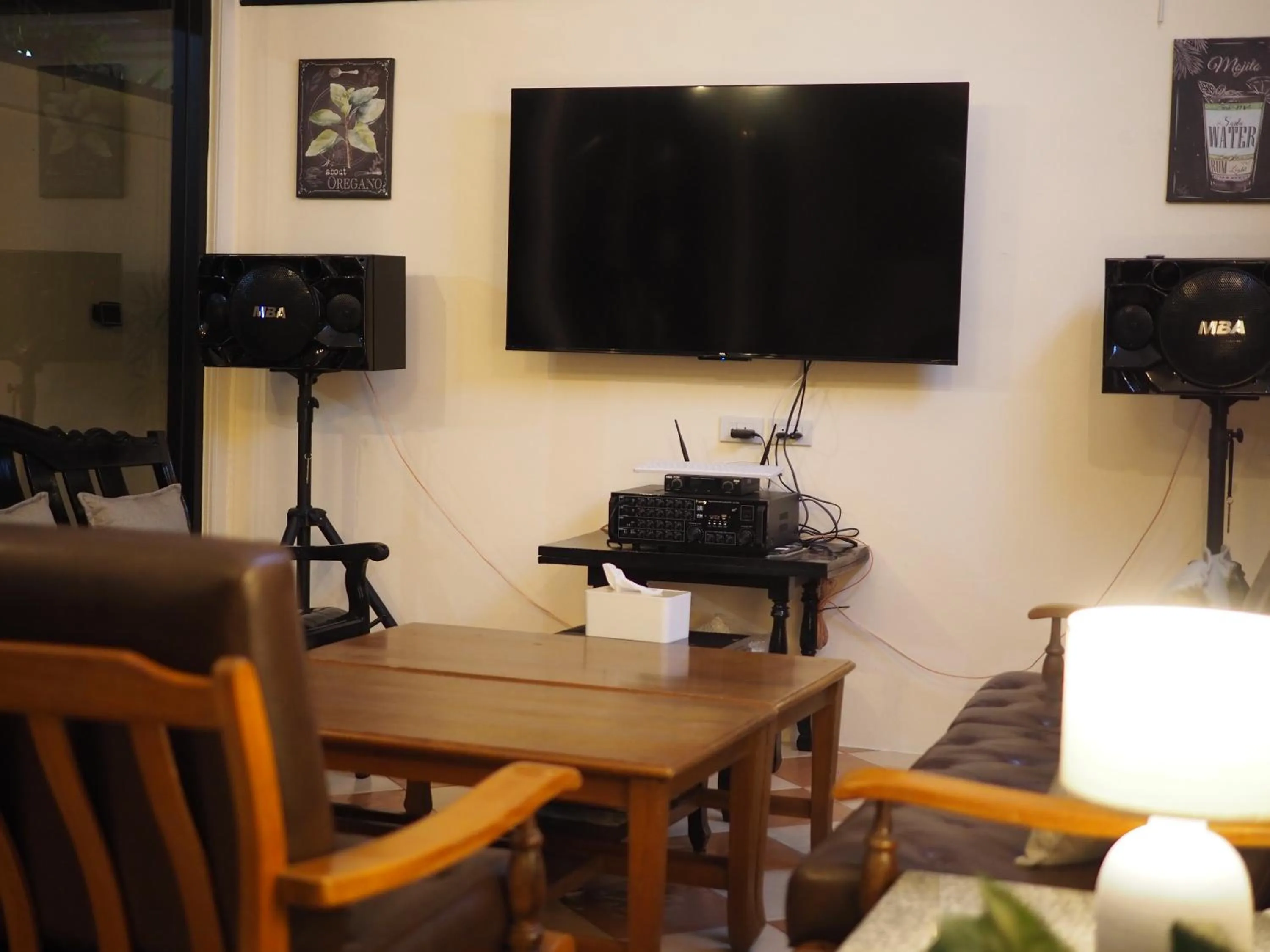 Communal lounge/ TV room in Mangoes Pattaya