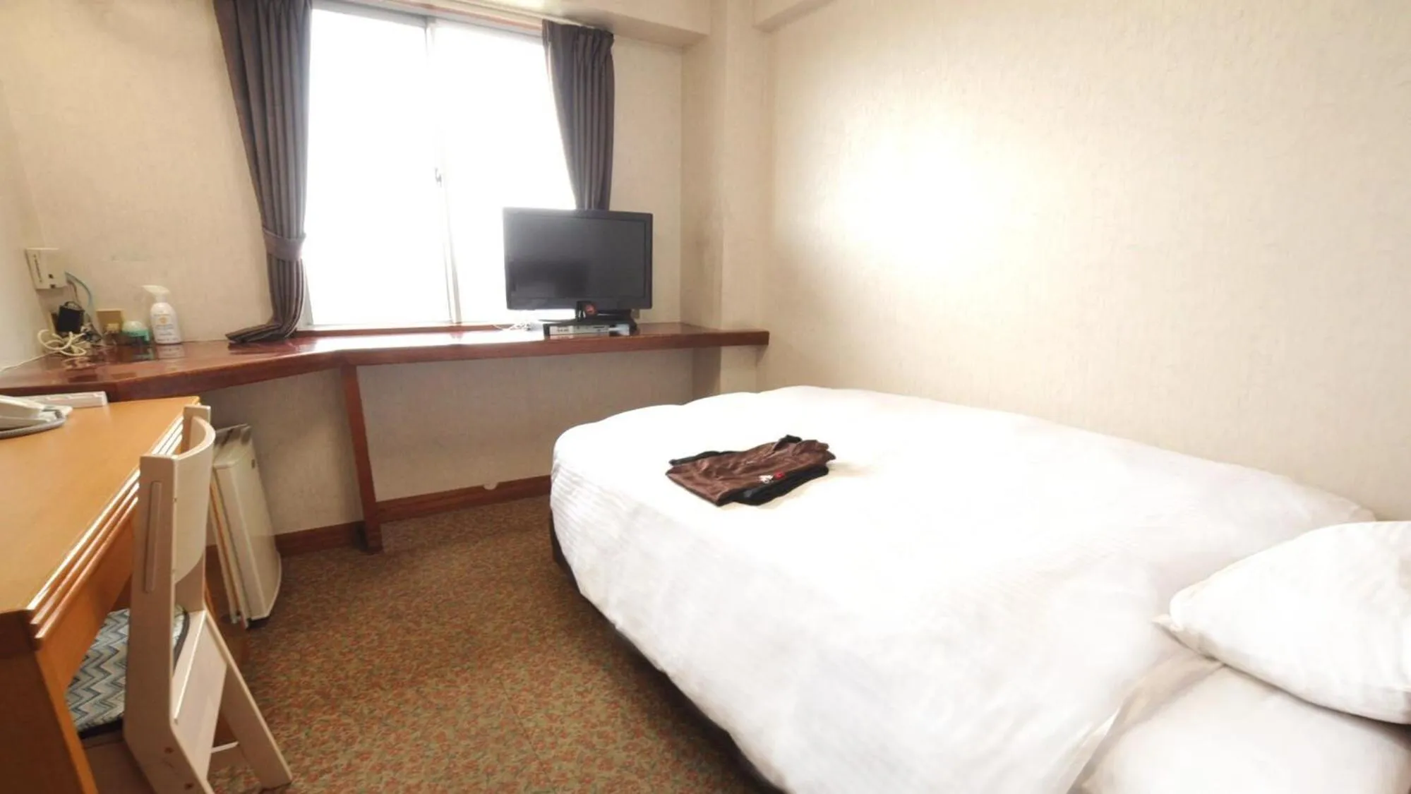 Bed in Handa Station Hotel