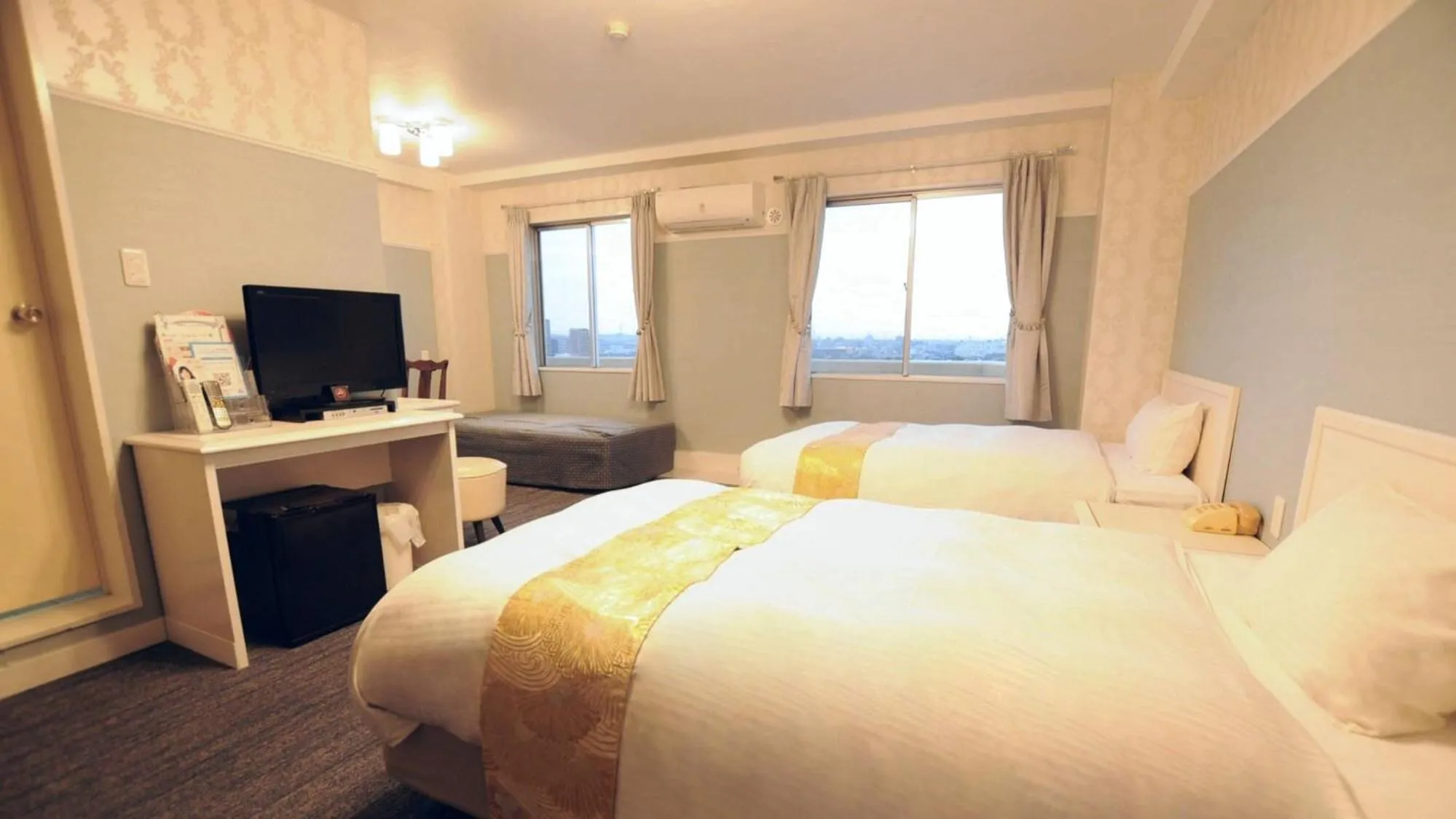 Bed in Handa Station Hotel