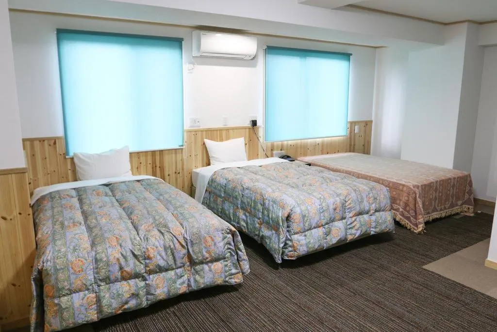 Bed in Handa Station Hotel