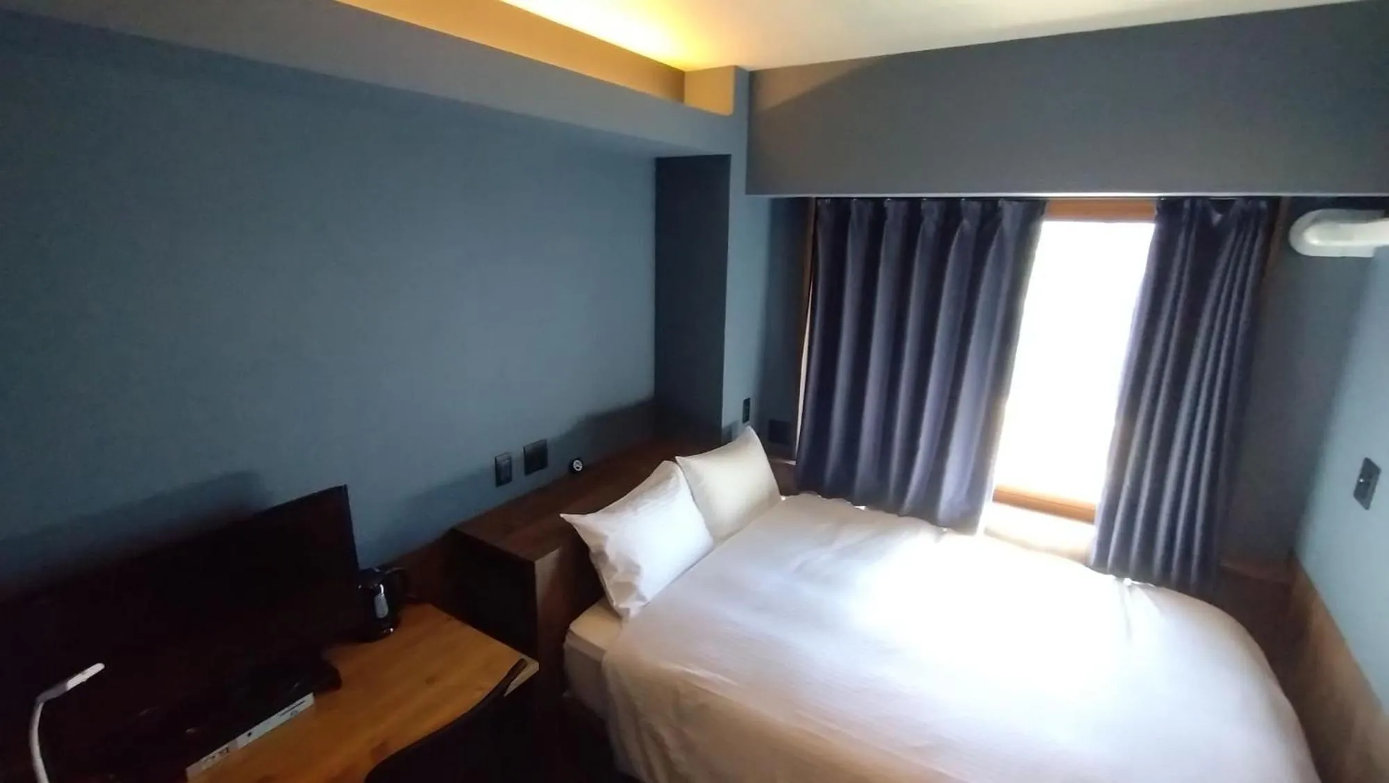 Bed in Handa Station Hotel