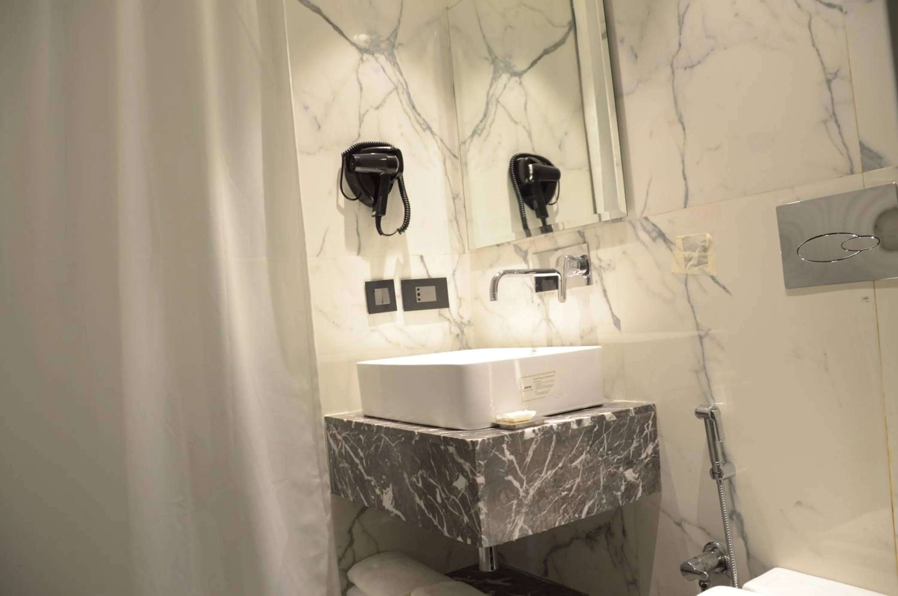 Bathroom in Connaught Royale Delhi