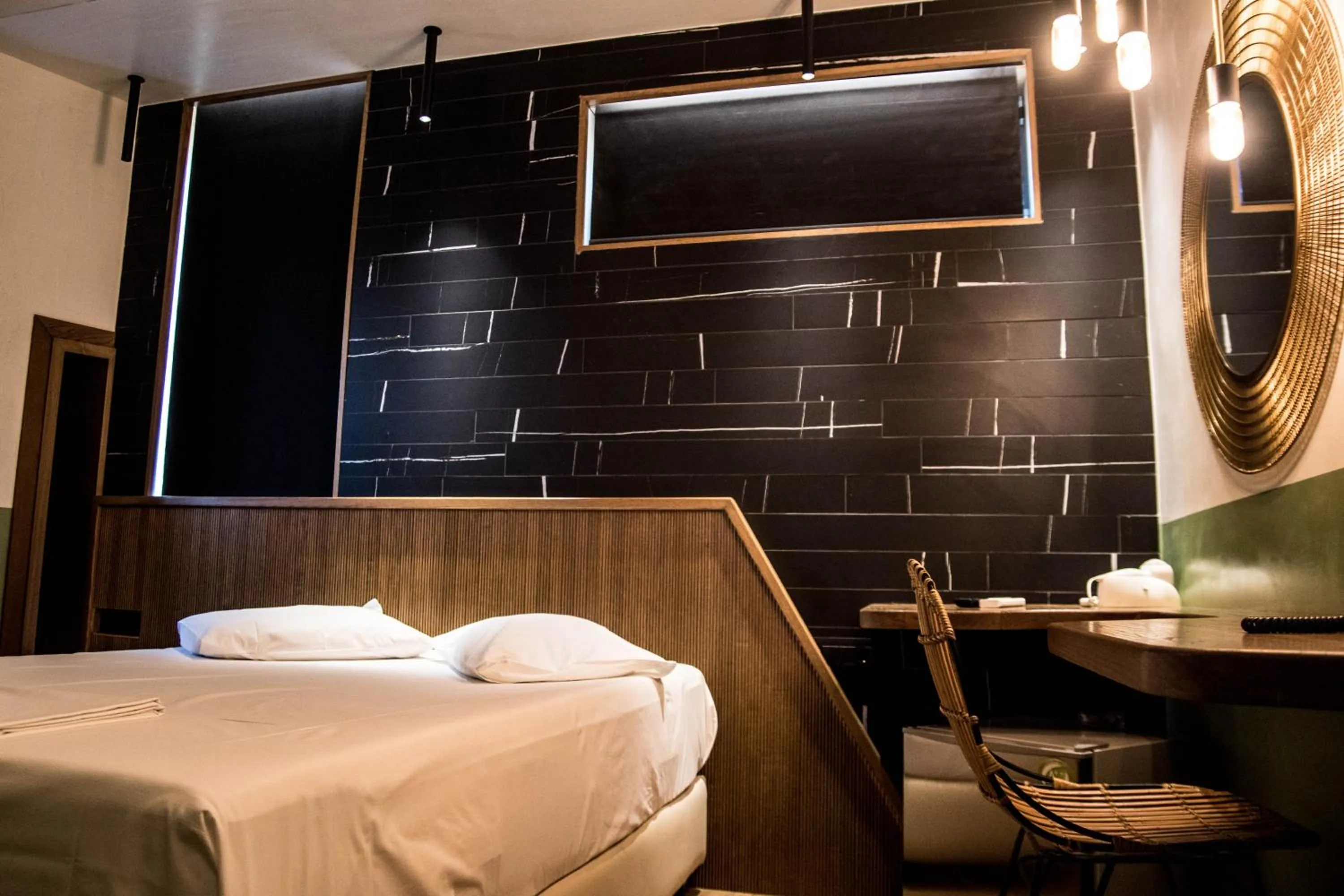 Bed in Adonis City Hotel