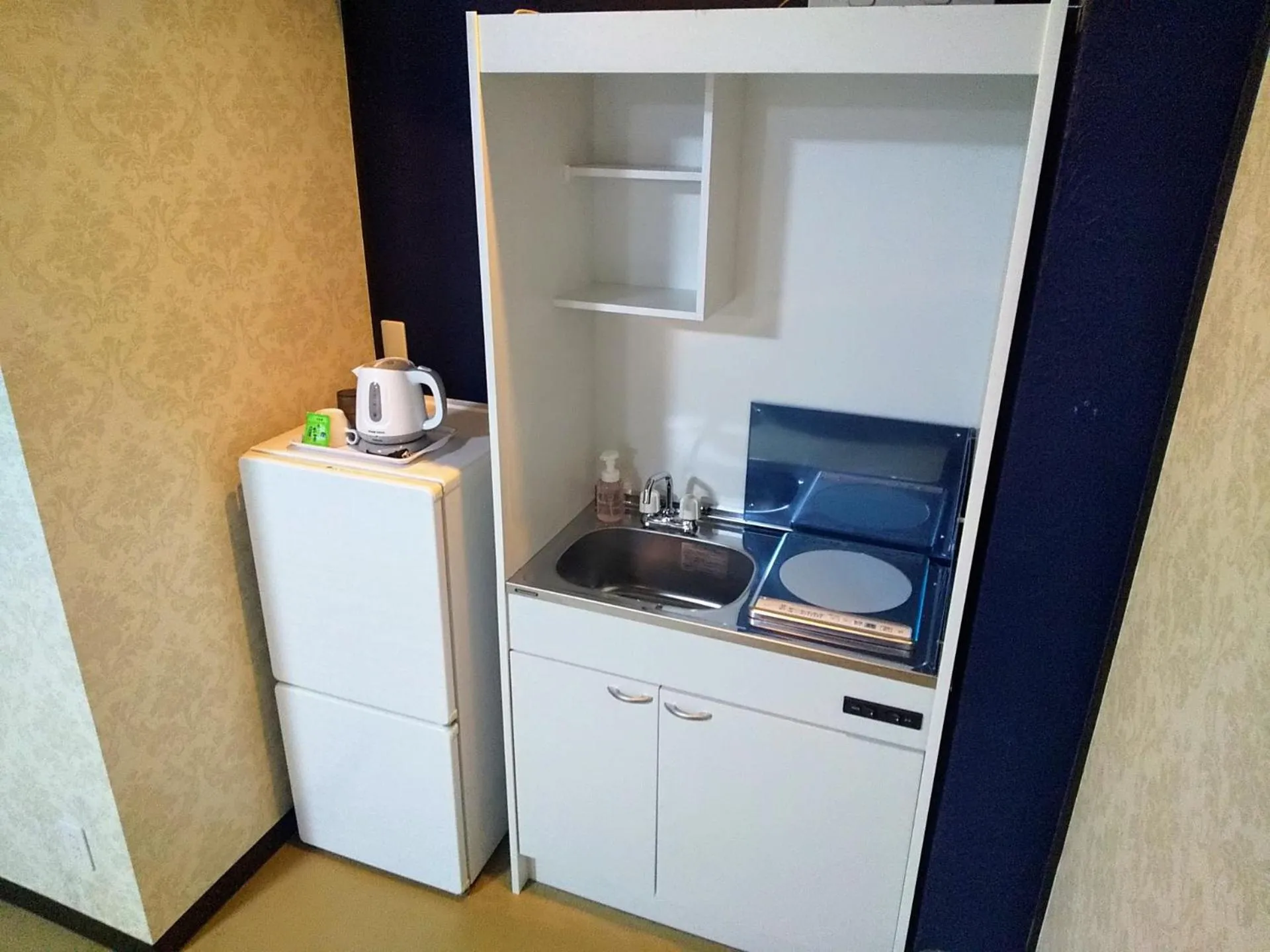 Kitchen or kitchenette in White Beach Inn Ishikawa