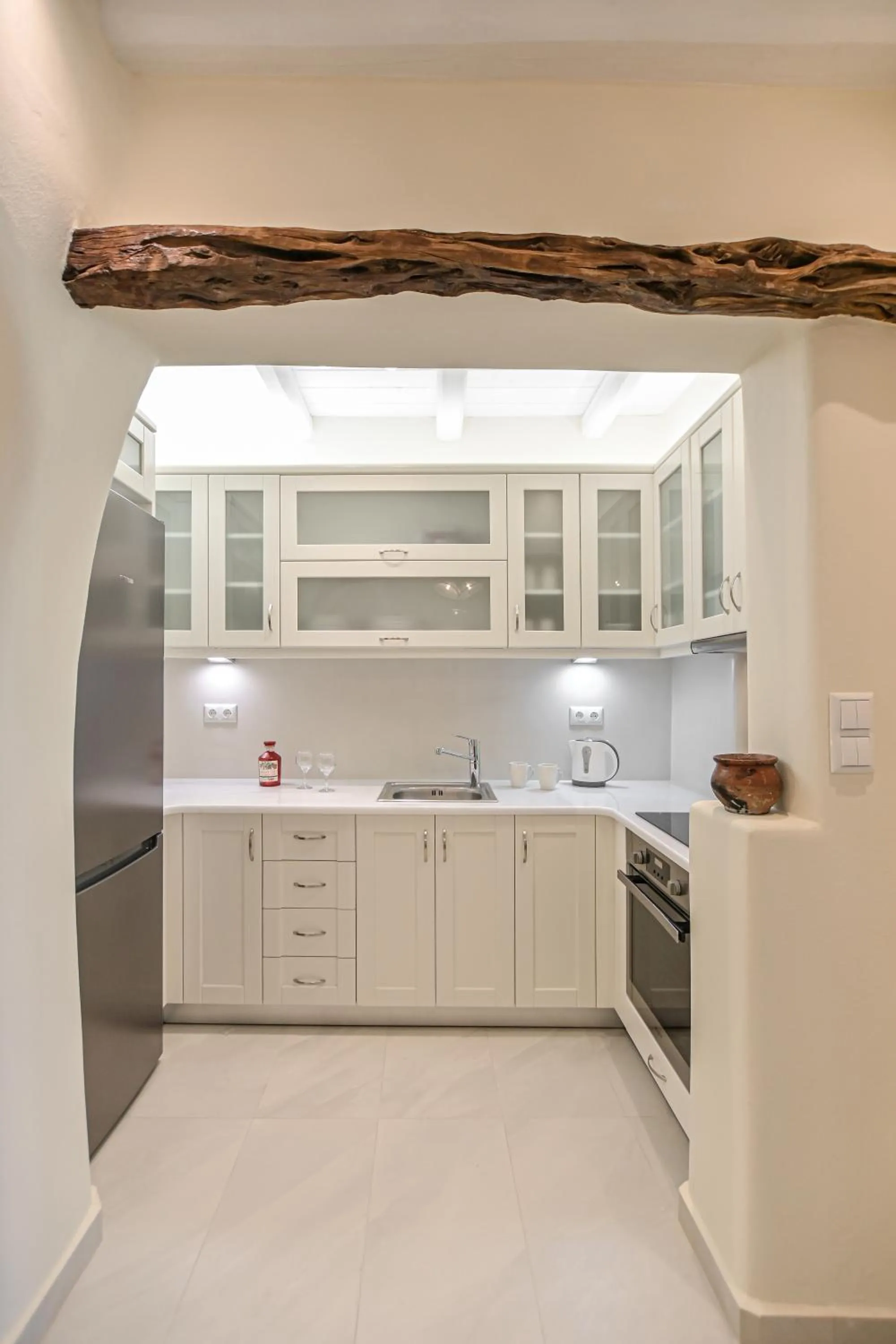 Kitchen or kitchenette in Naxian Queen Luxury Villas & Suites