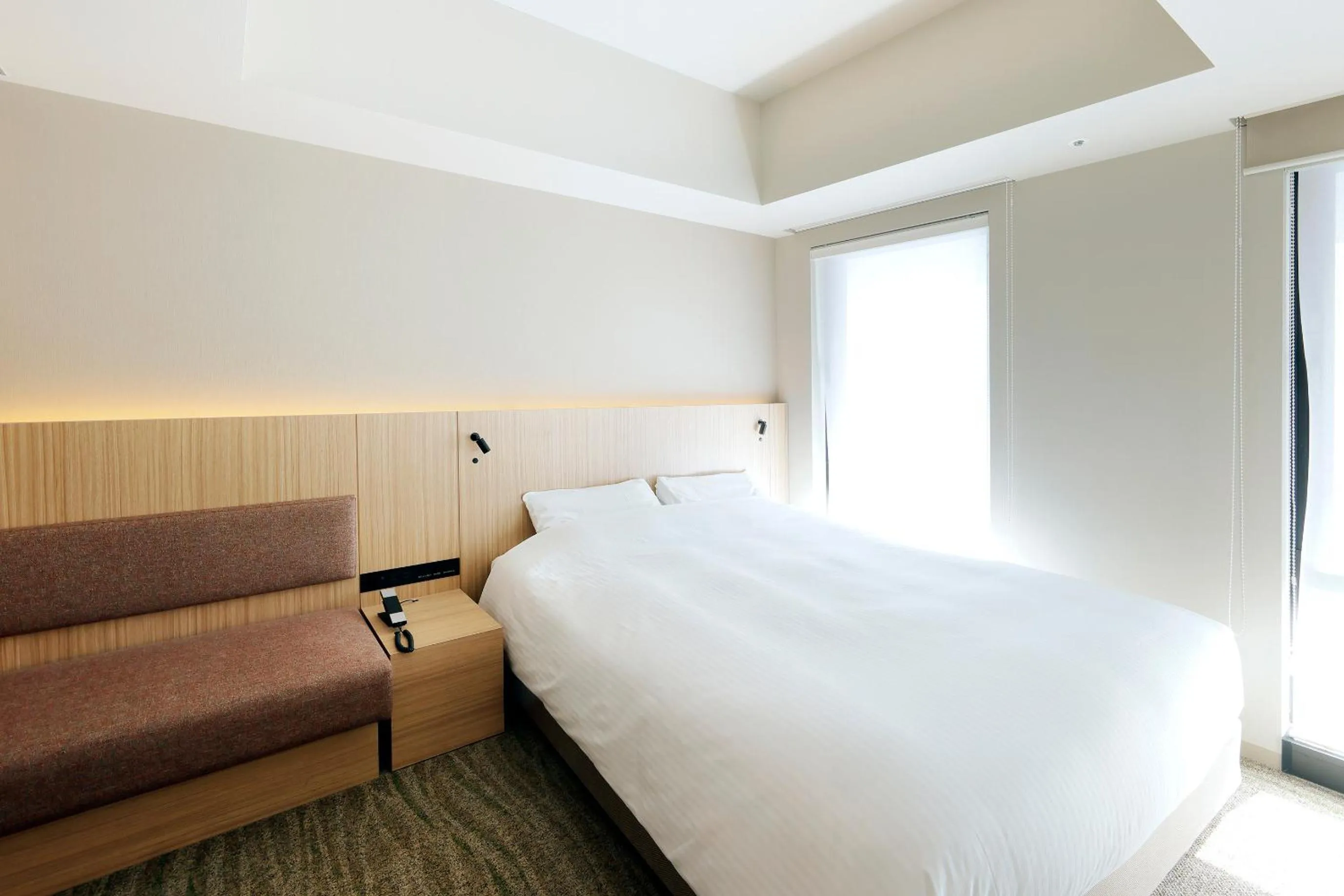 Bed in JR Inn Sapporo-eki Minami-guchi