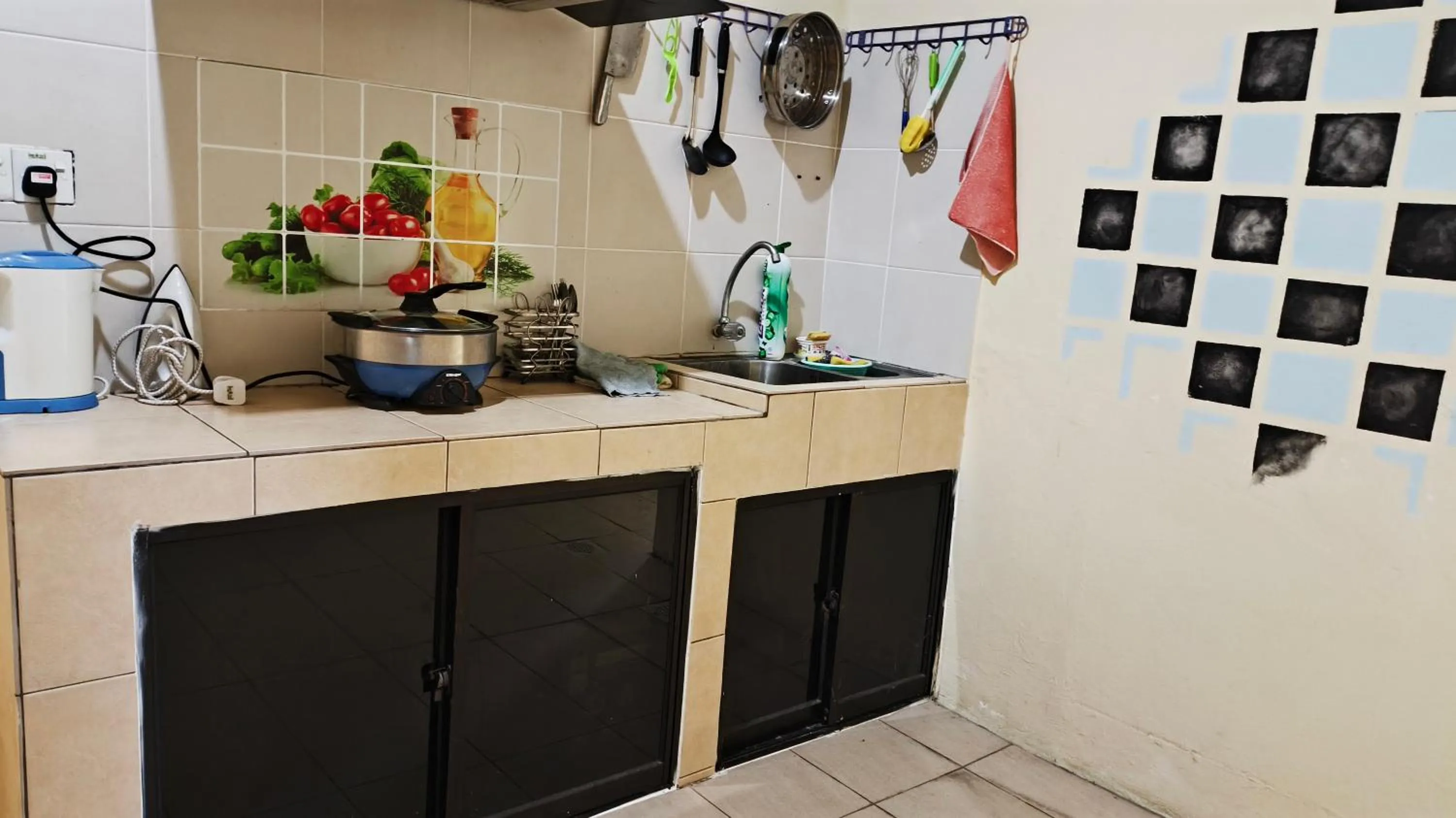 Kitchen or kitchenette in Natol Homestay - LA Tabuan Jaya