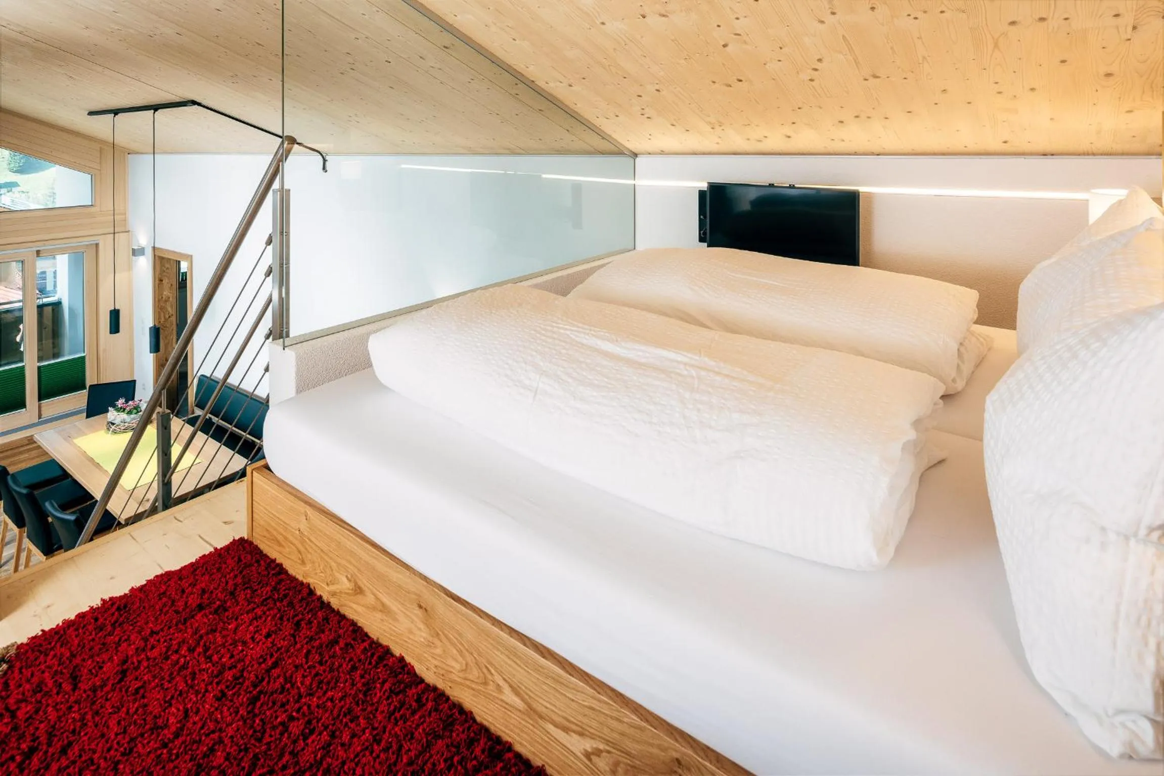 TV and multimedia, Bed in Nowders Apartments