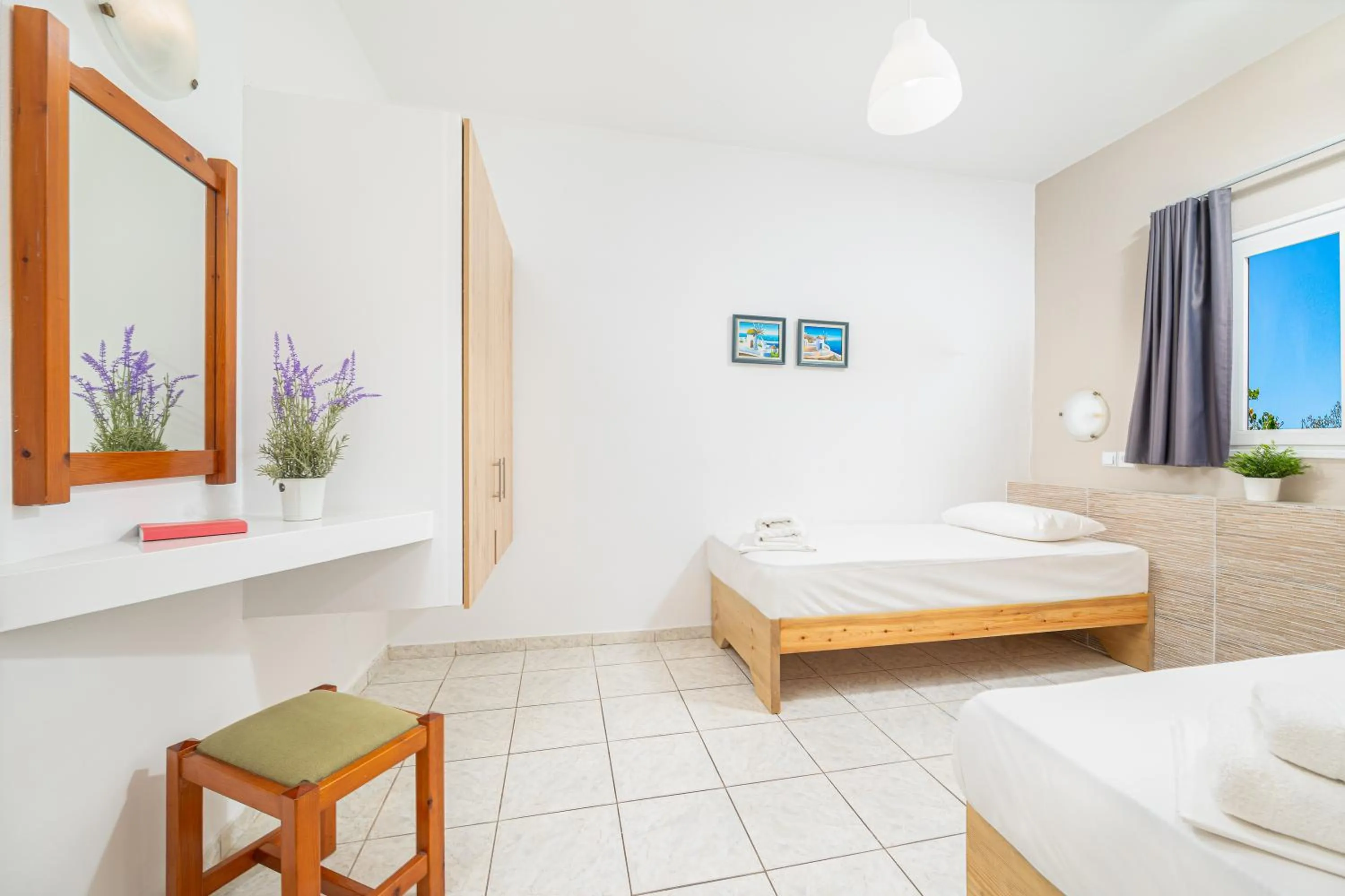 Bed in Mylos Apartments Anissaras