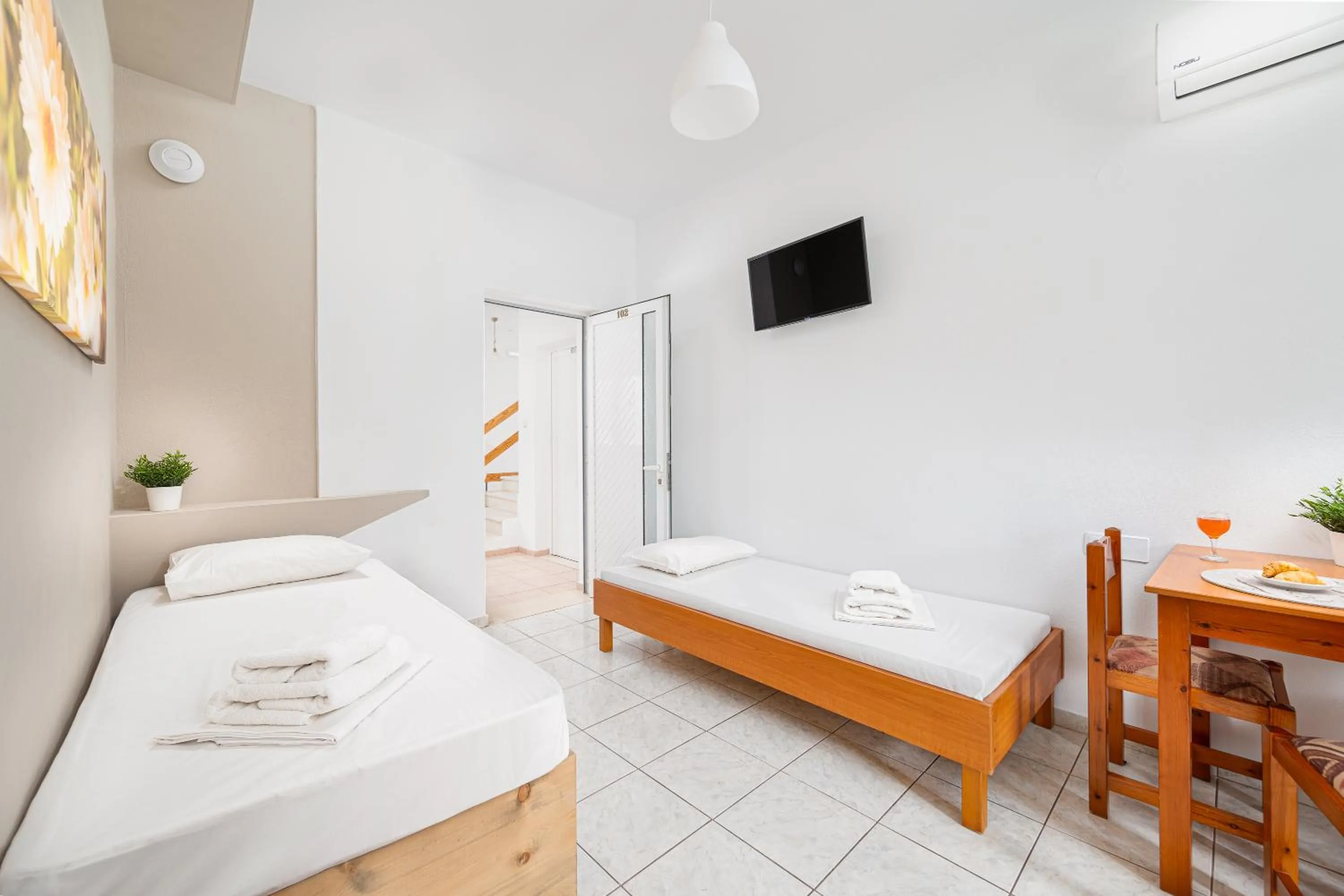 Bed in Mylos Apartments Anissaras