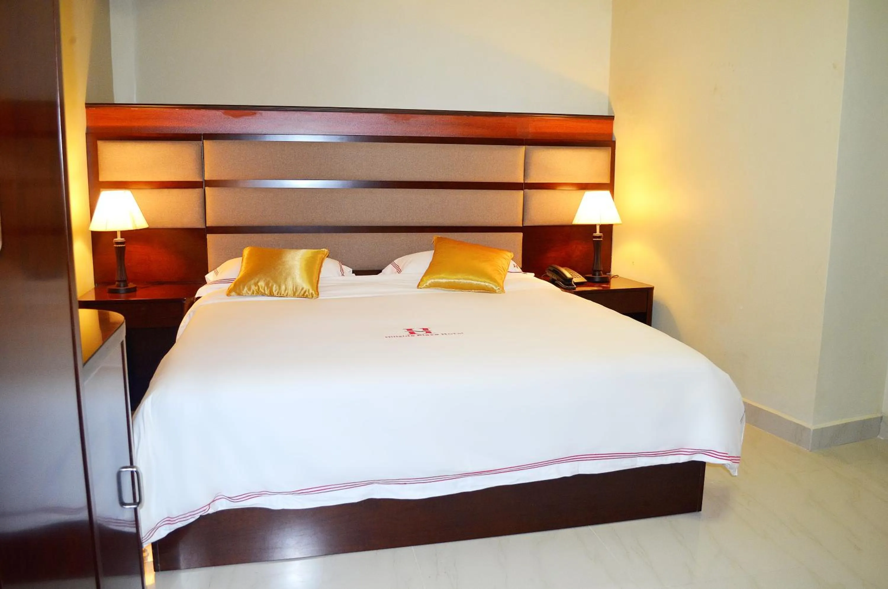 Decorative detail, Bed in Hillside Plaza Hotel