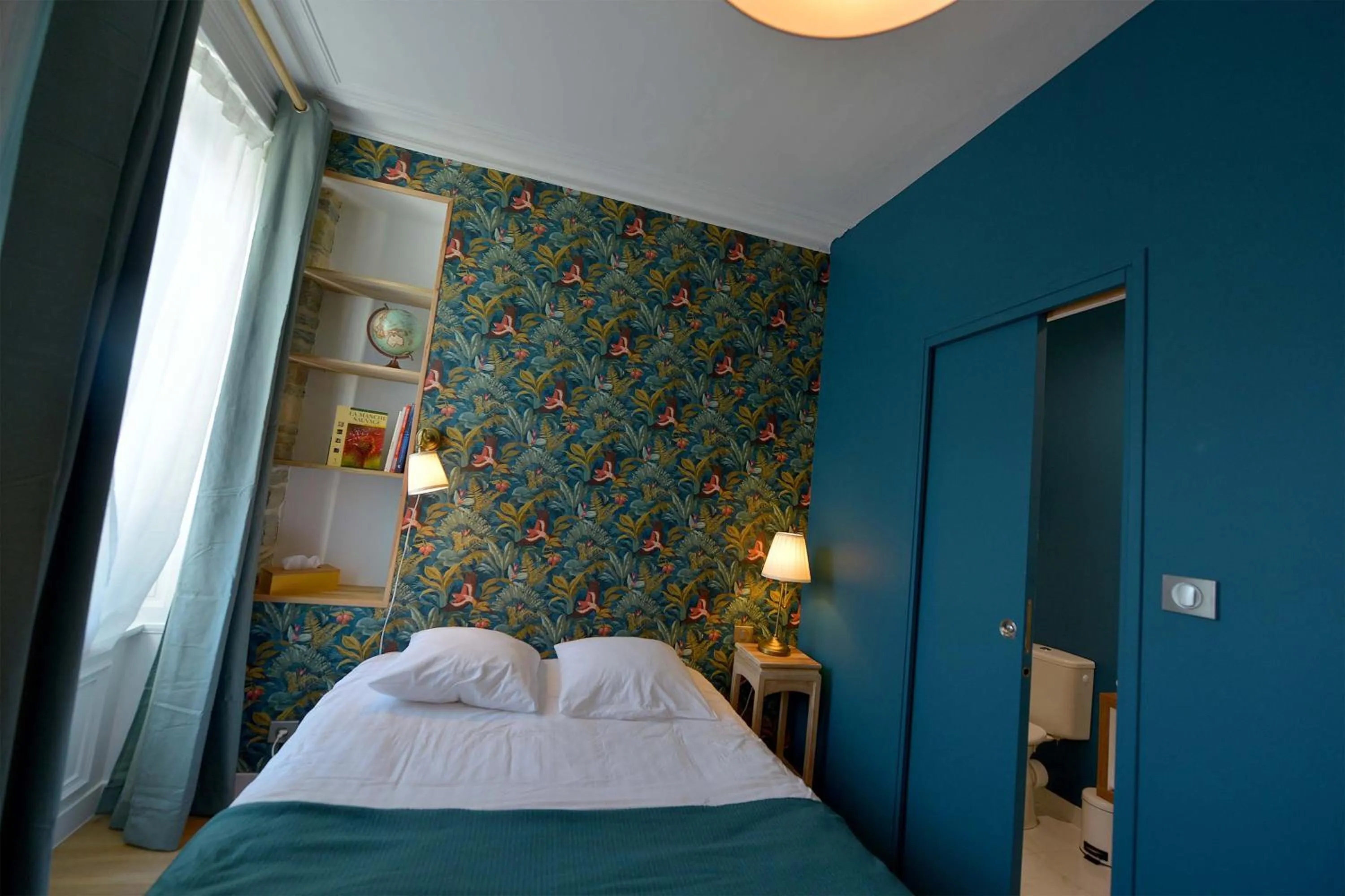 Photo of the whole room, Bed in Hôtel Le Tiburon