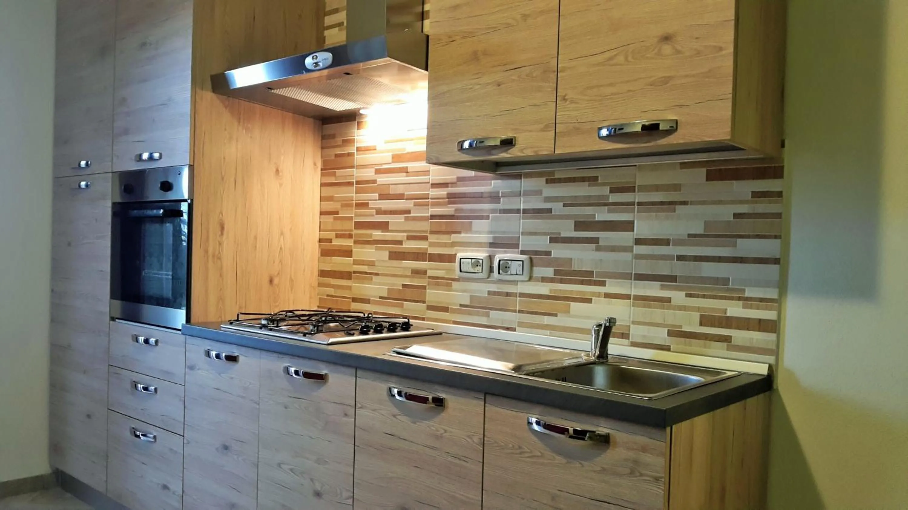 Kitchen or kitchenette in Casa Vacanze residence Cavour