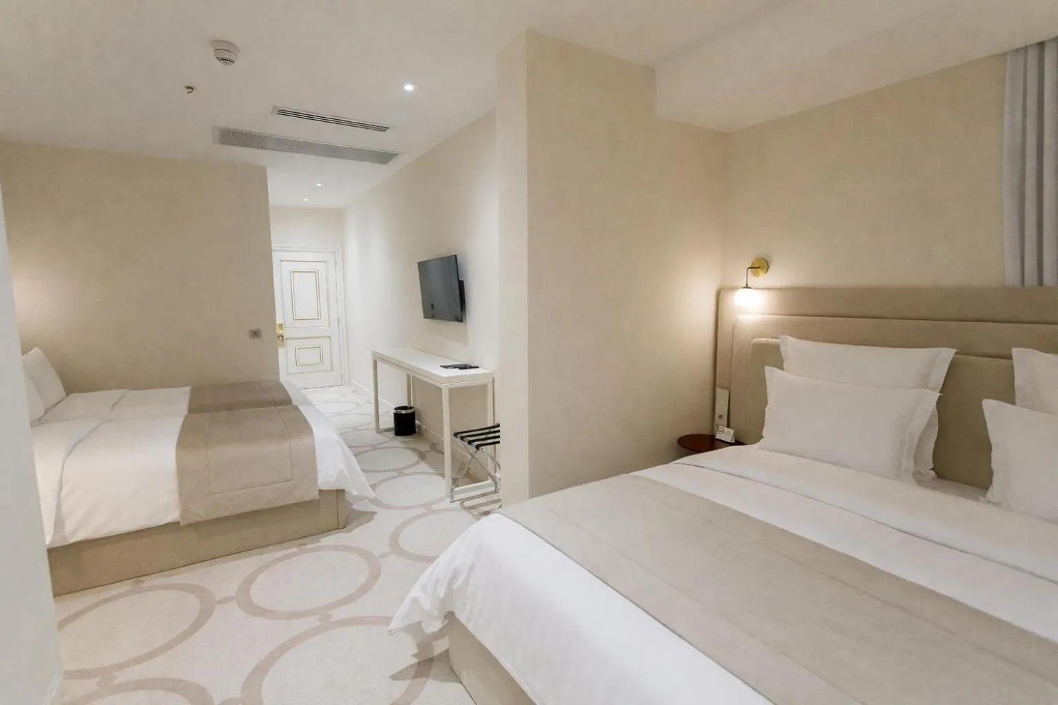 Bed in Ambassadori Tbilisi Hotel